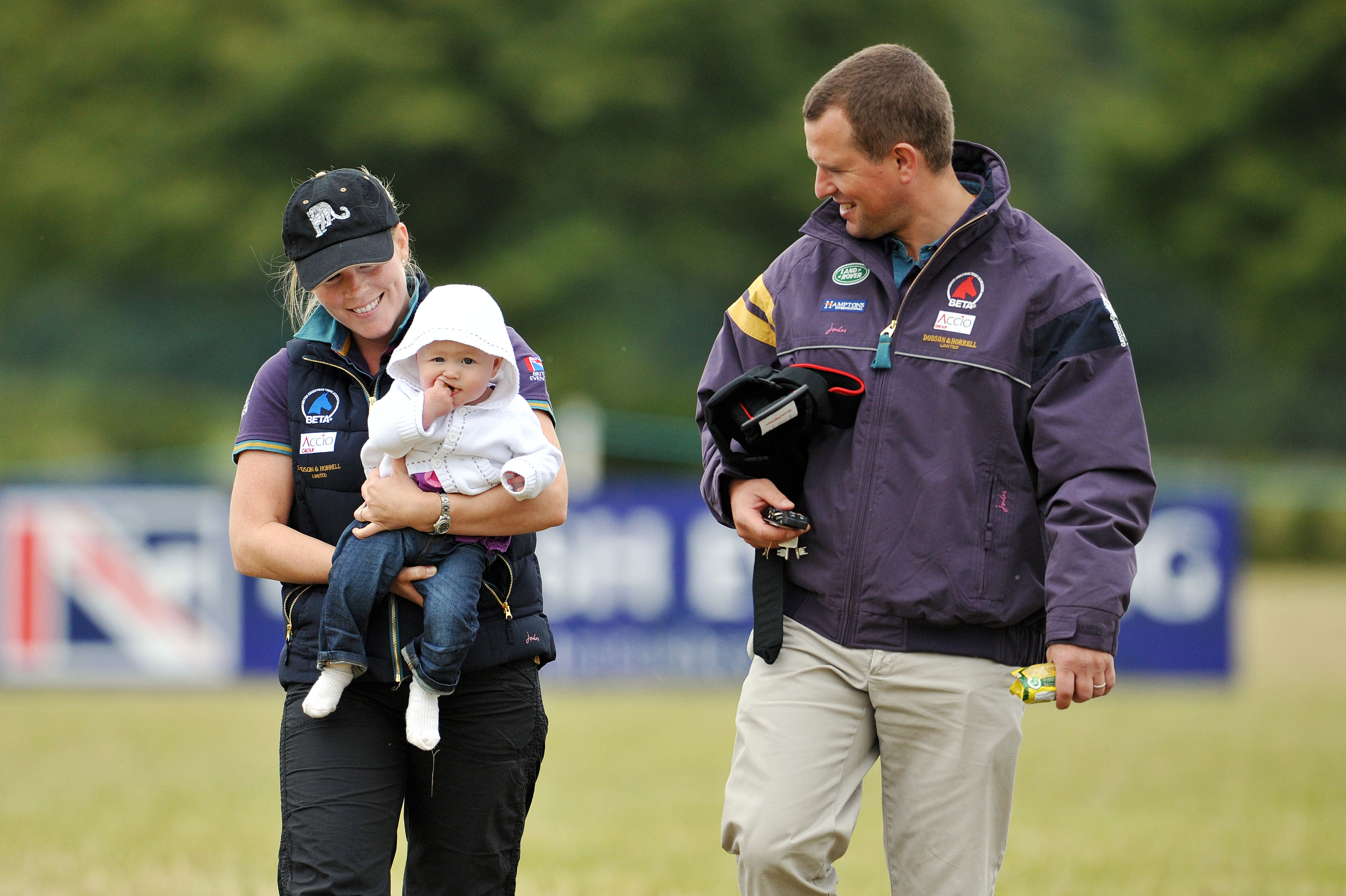 Peter and Autumn Phillips with their daughter Savannah at the Gatcombe Park Festival of British Eventing on August 6, 2011 | Source: Getty Images