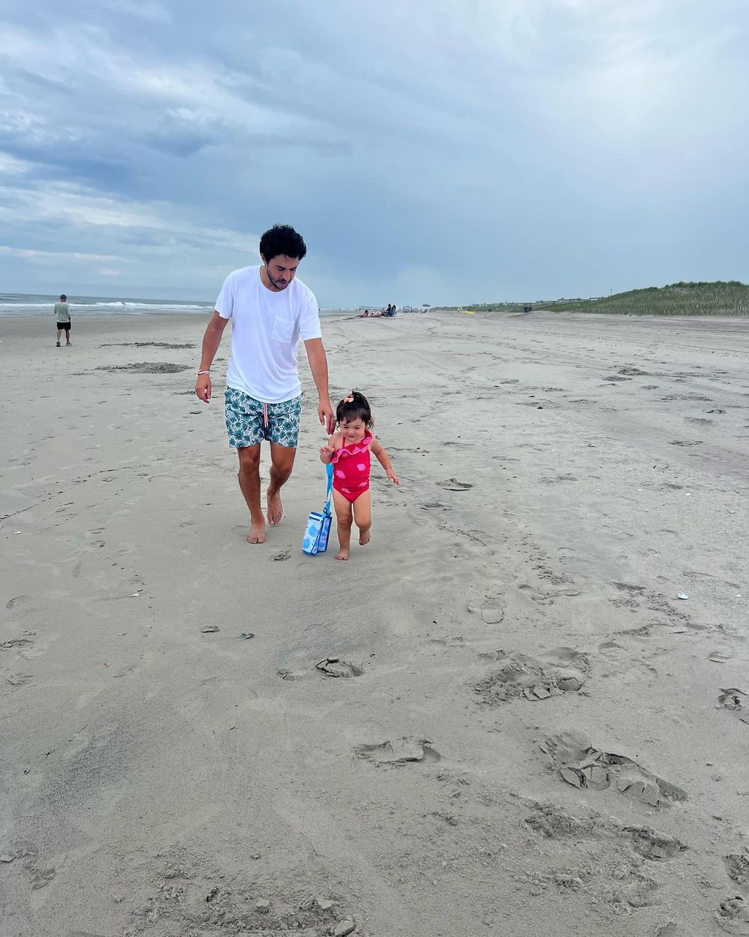 Johnny and Noa Gaudreau enjoying family time at the beach, from an Instagram slideshow of pictures, dated September 1, 2024 | Source: Instagram/meredithgaudreau_