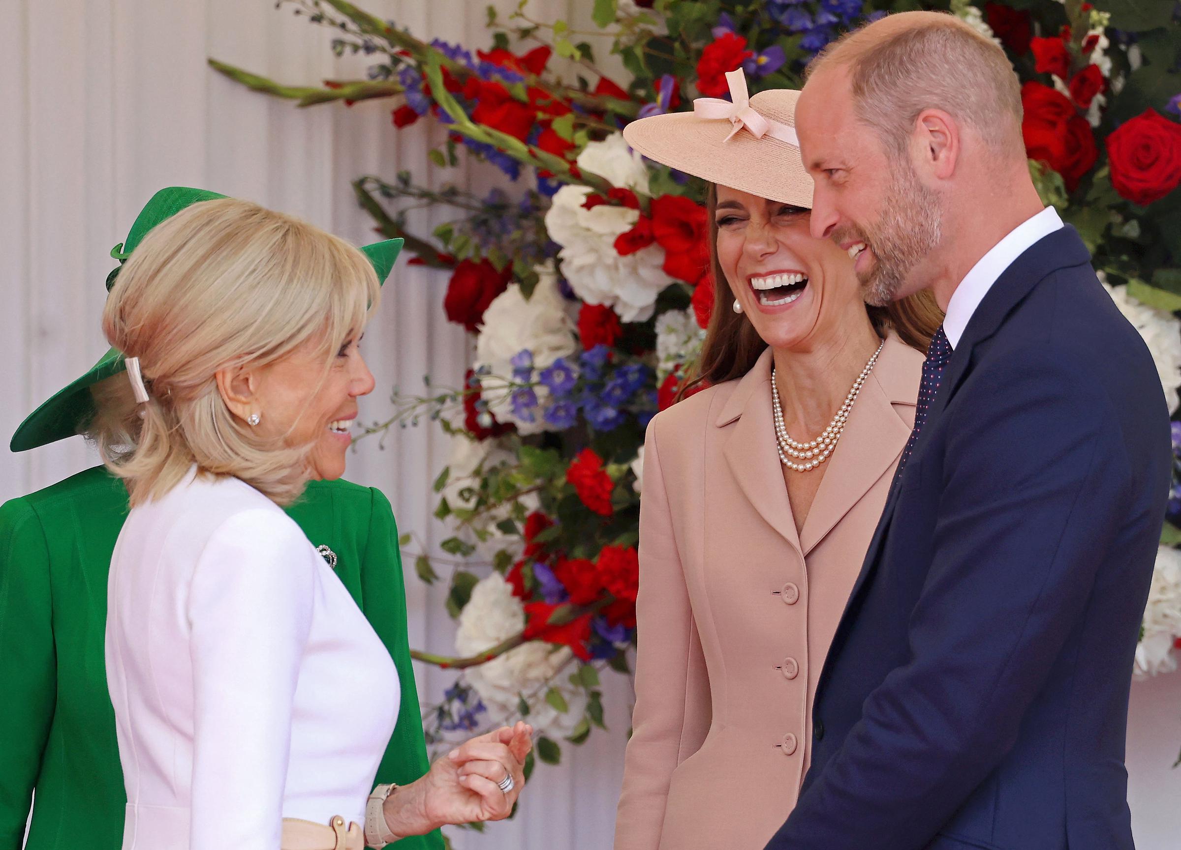 Princess Catherine let out a big laugh as she and her husband, Prince William, spoke to First Lady Brigitte Macron.