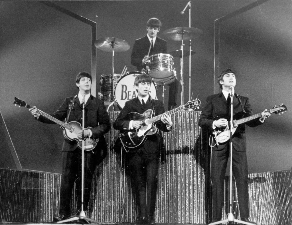 The Beatles on stage at the London Palladium during a performance in front of 2, 000 screaming fans. | Getty Images / Global Images Ukraine The Beatles on stage at the London Palladium during a performance in front of 2, 000 screaming fans. | Getty Images / Global Images Ukraine