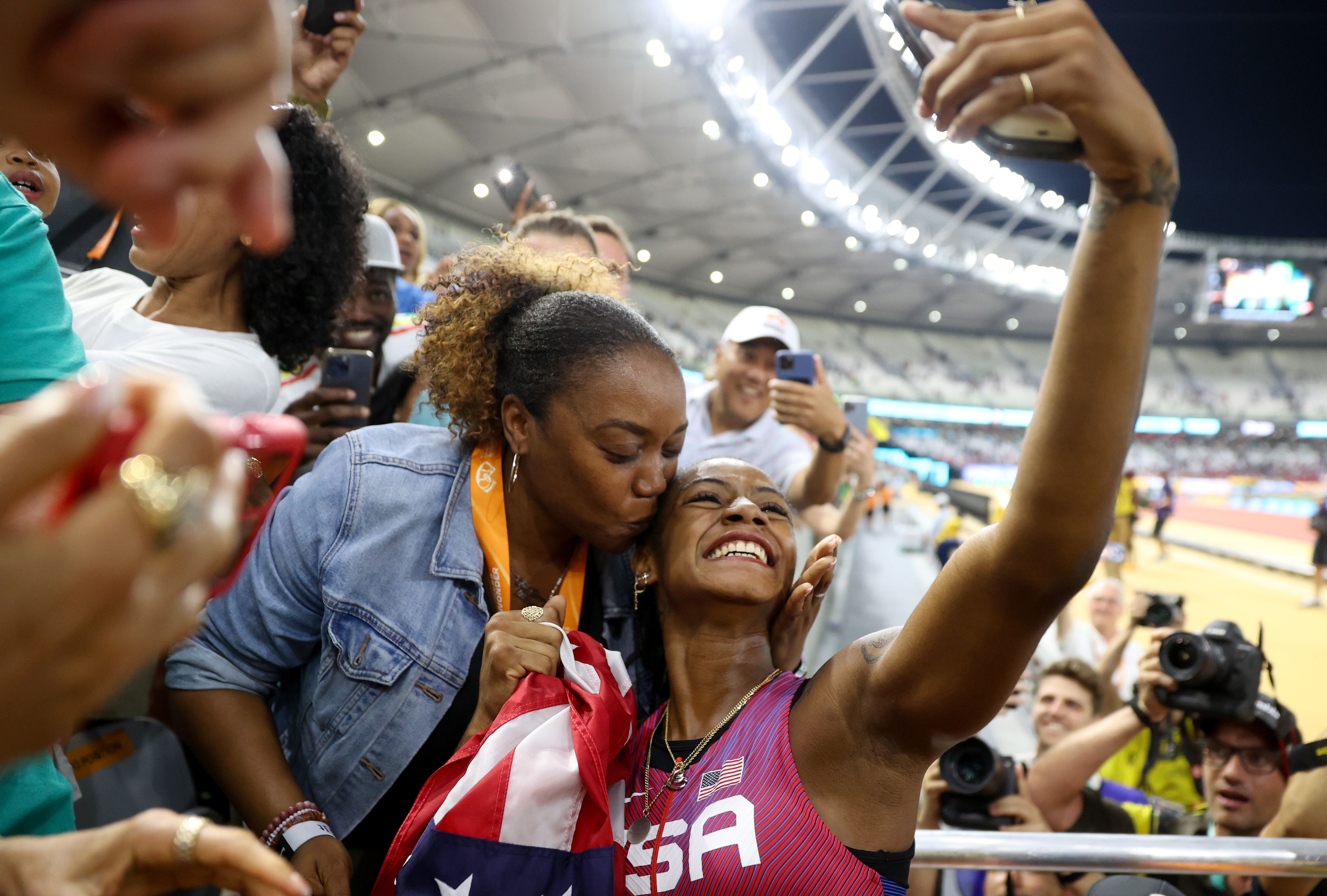 Sha'Carri Richardson celebrates winning the Women's 100m Final with Shayaria Richardson during the World Athletics Championships Budapest 2023 on August 21, 2023, in Budapest, Hungary. | Source: Getty Images