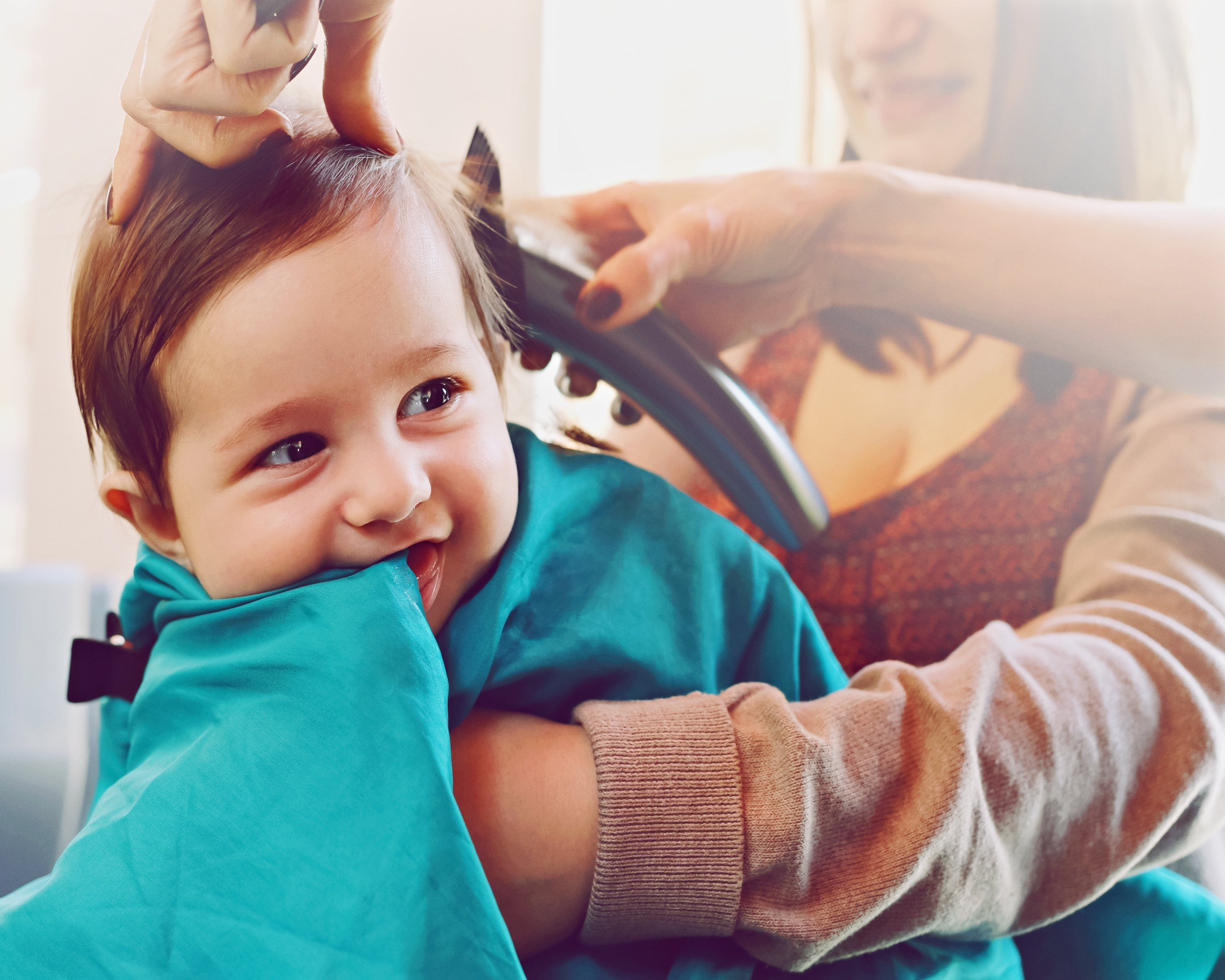 Baby sitting at the hair salon, | Photo: Getty Images