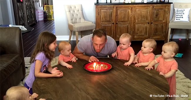 Dad makes a wish and blows out the candles, but then his daughters begin to cry