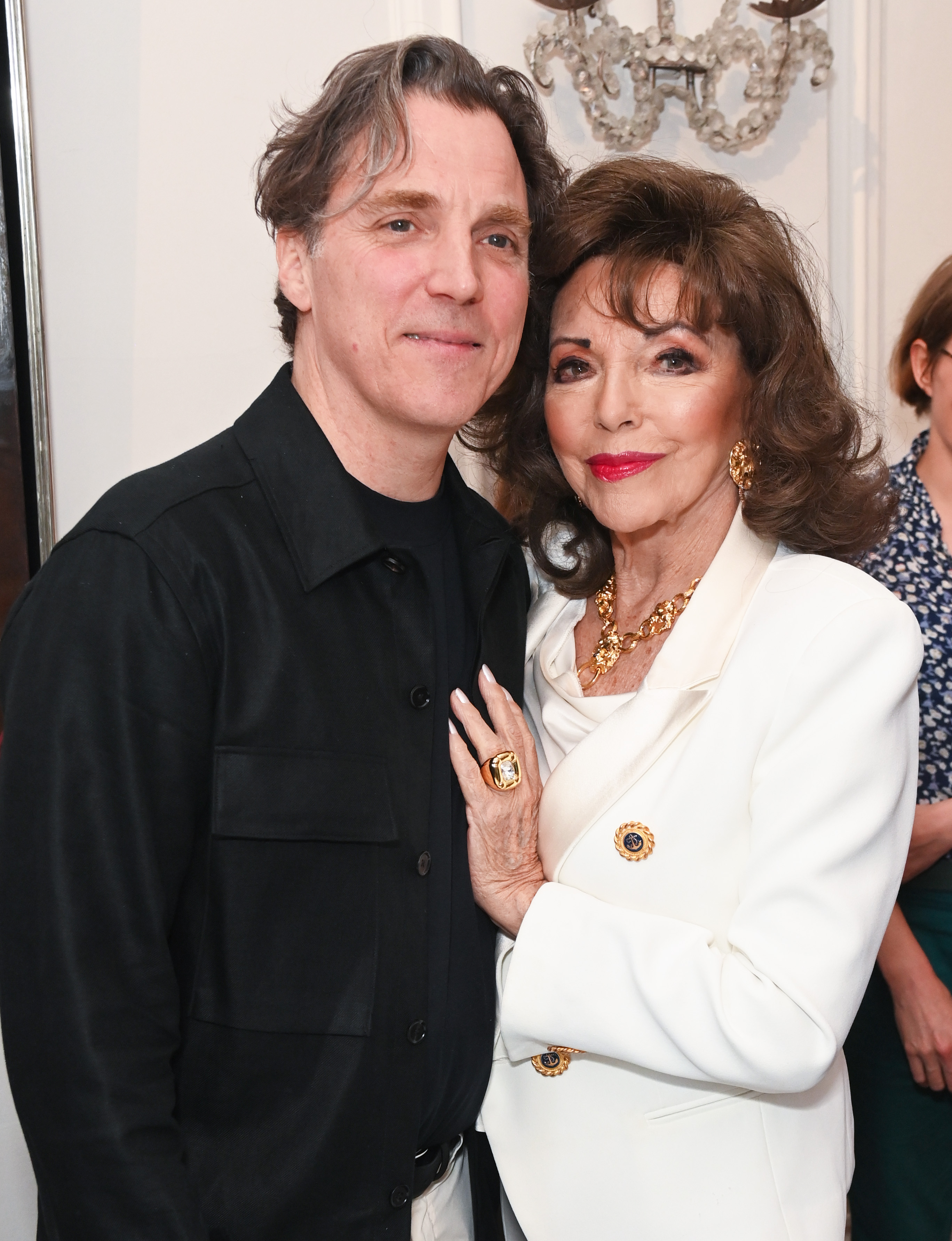 Alexander Newley and Joan Collins attend the launch of new book "Divining The Human: The Art Of Alexander Newley" at Ognisko Polskie in London, England on June 8, 2023 | Source: Getty Images