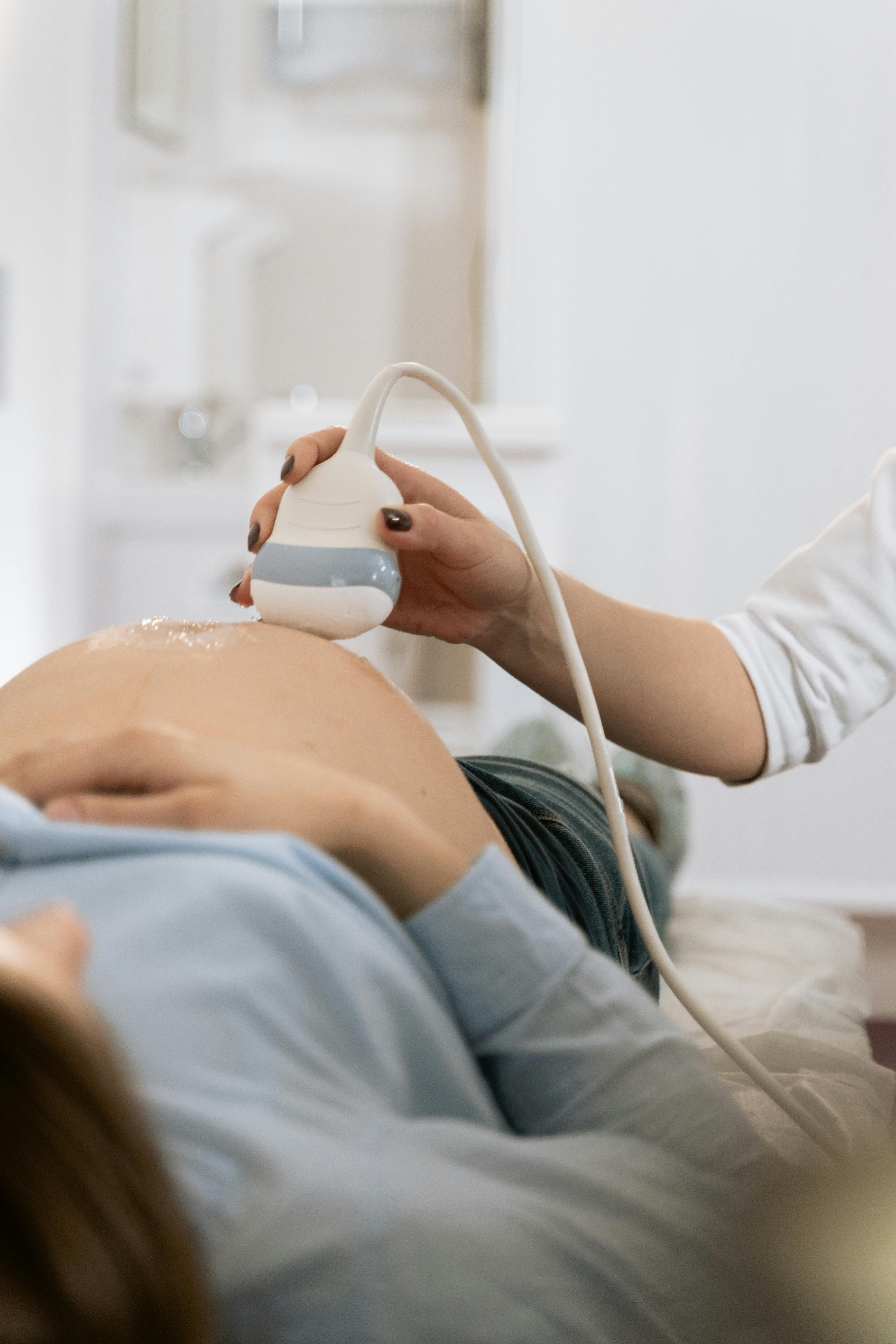A pregnant woman during an ultrasound | Source: MART PRODUCTION on Pexels