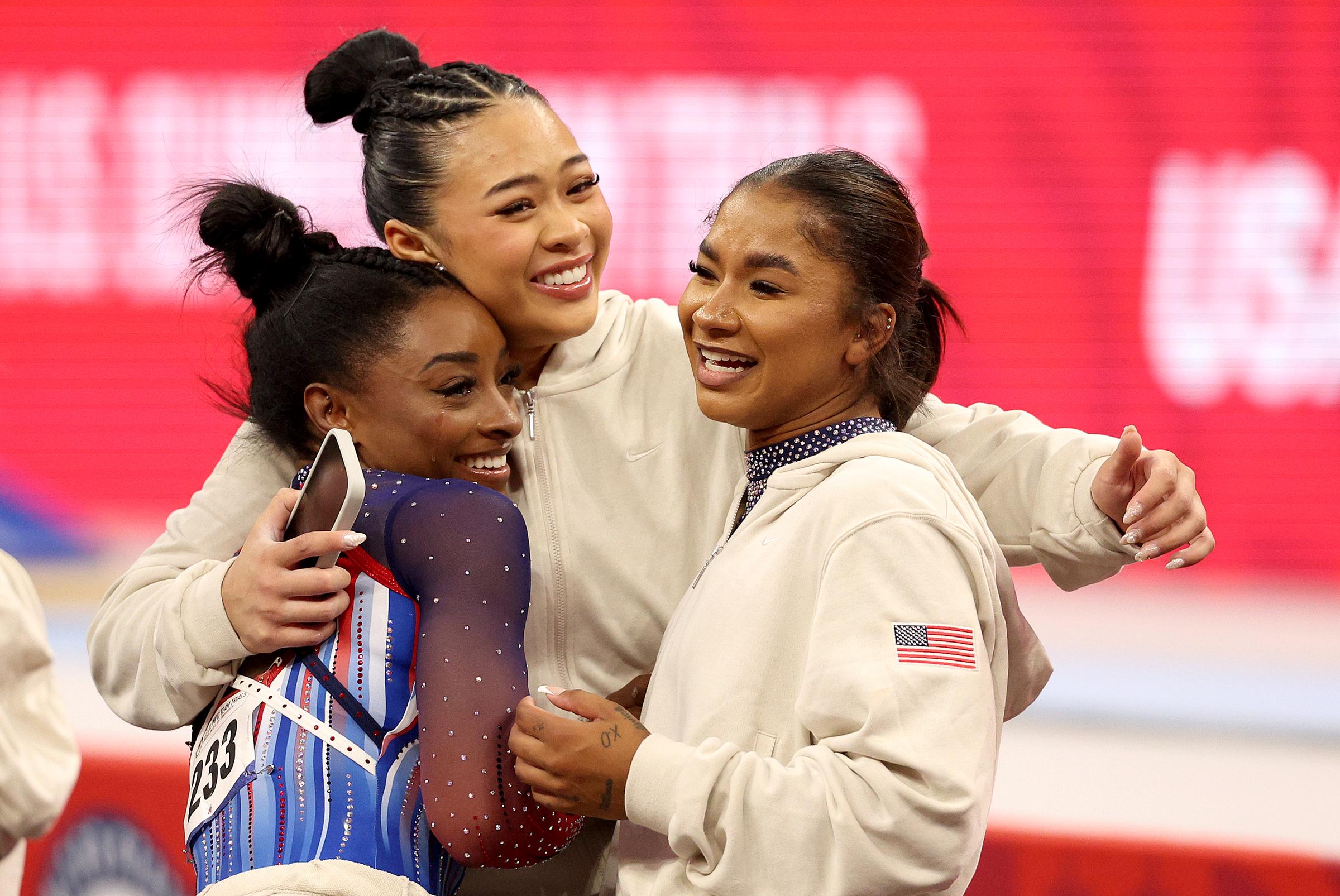 Simone Biles, Suni Lee, and Jordan Chiles react after competing at the US Olympic Team Gymnastics Trials on June 30, 2024, in Minneapolis, Minnesota | Source: Getty Images