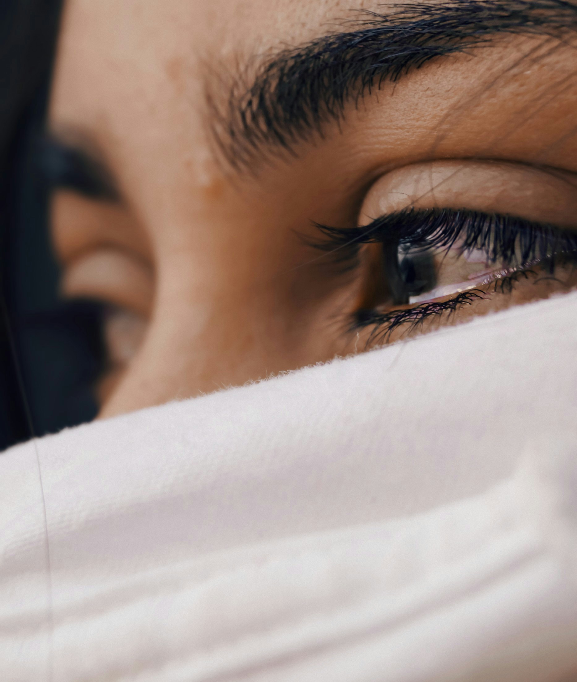 An extremely hurt teary-eyed woman | Source: Unsplash