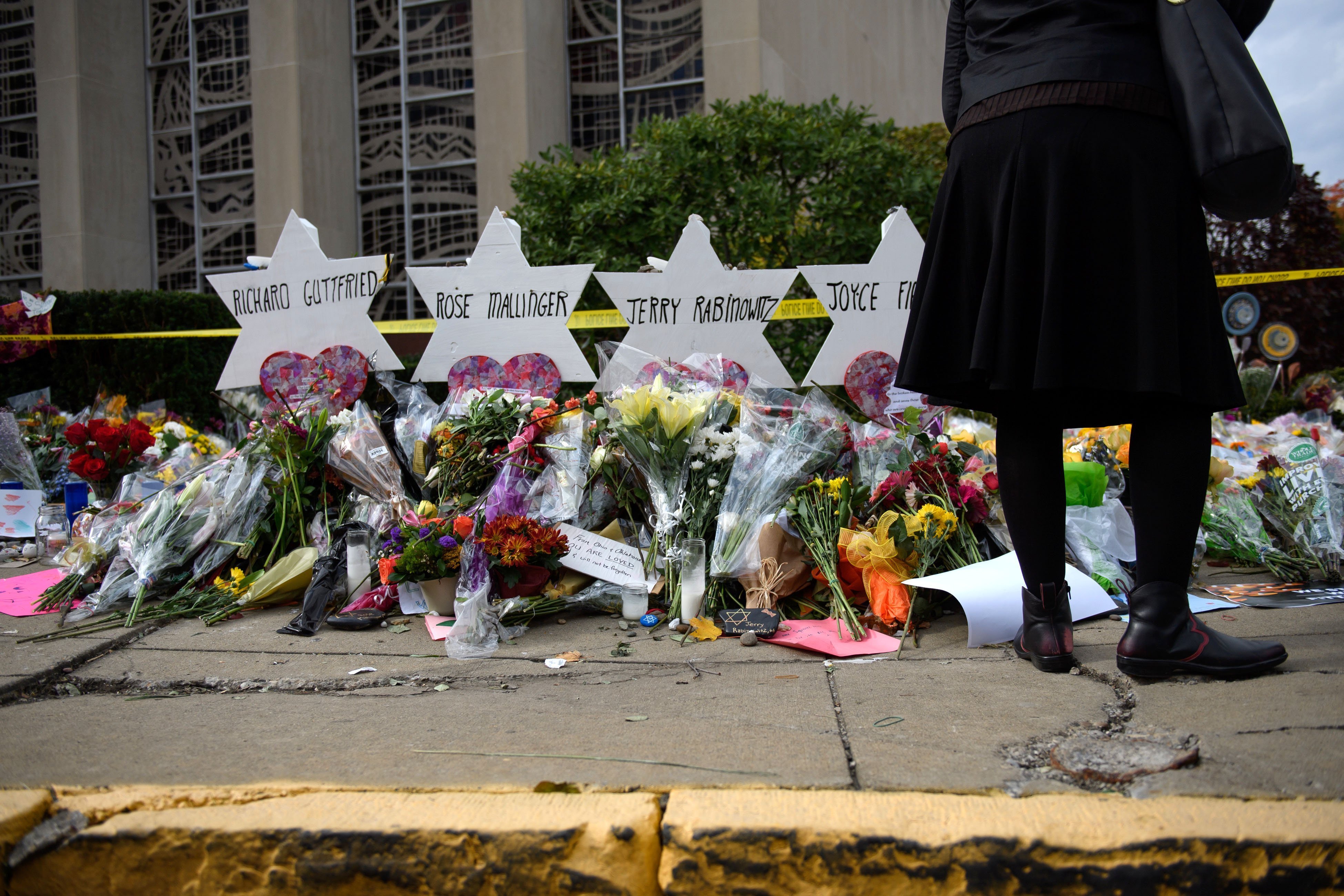 Flowers in memory of those who perished in the Pittsburgh shooting - Getty Images