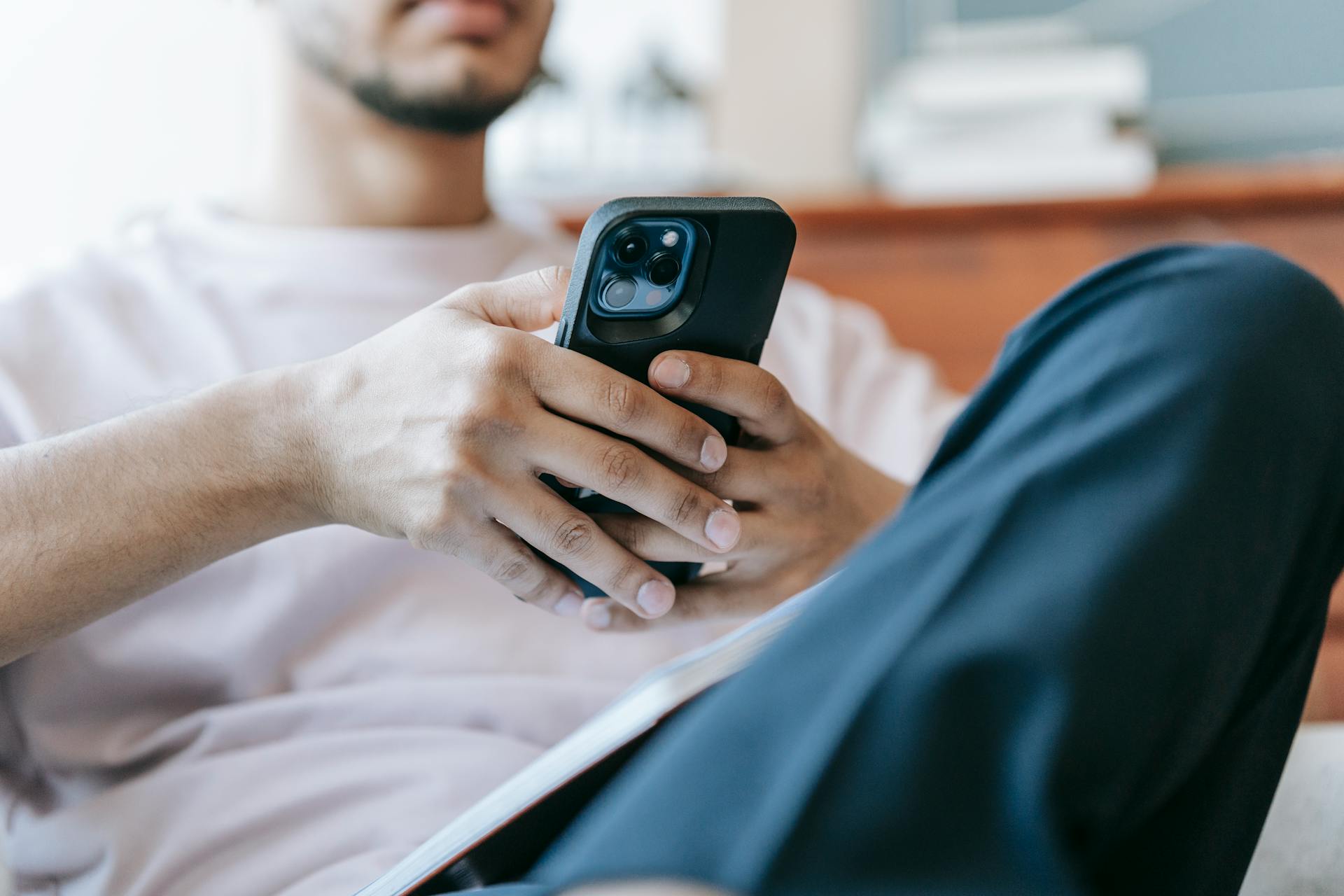 A man using his phone | Source: Pexels