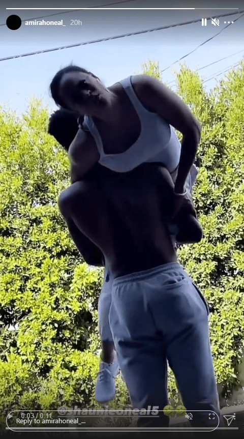 Shaunie O'Neal's son carries her in his arms | Photo: Instagram.com/amirahoneal_