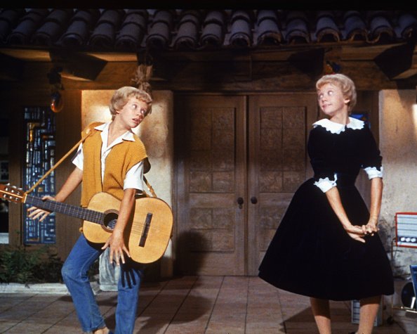 Hayley Mills as identical twins Sharon McKendrick and Susan Evers in the Walt Disney comedy "The Parent Trap," circa 1961. | Photo: Getty Images