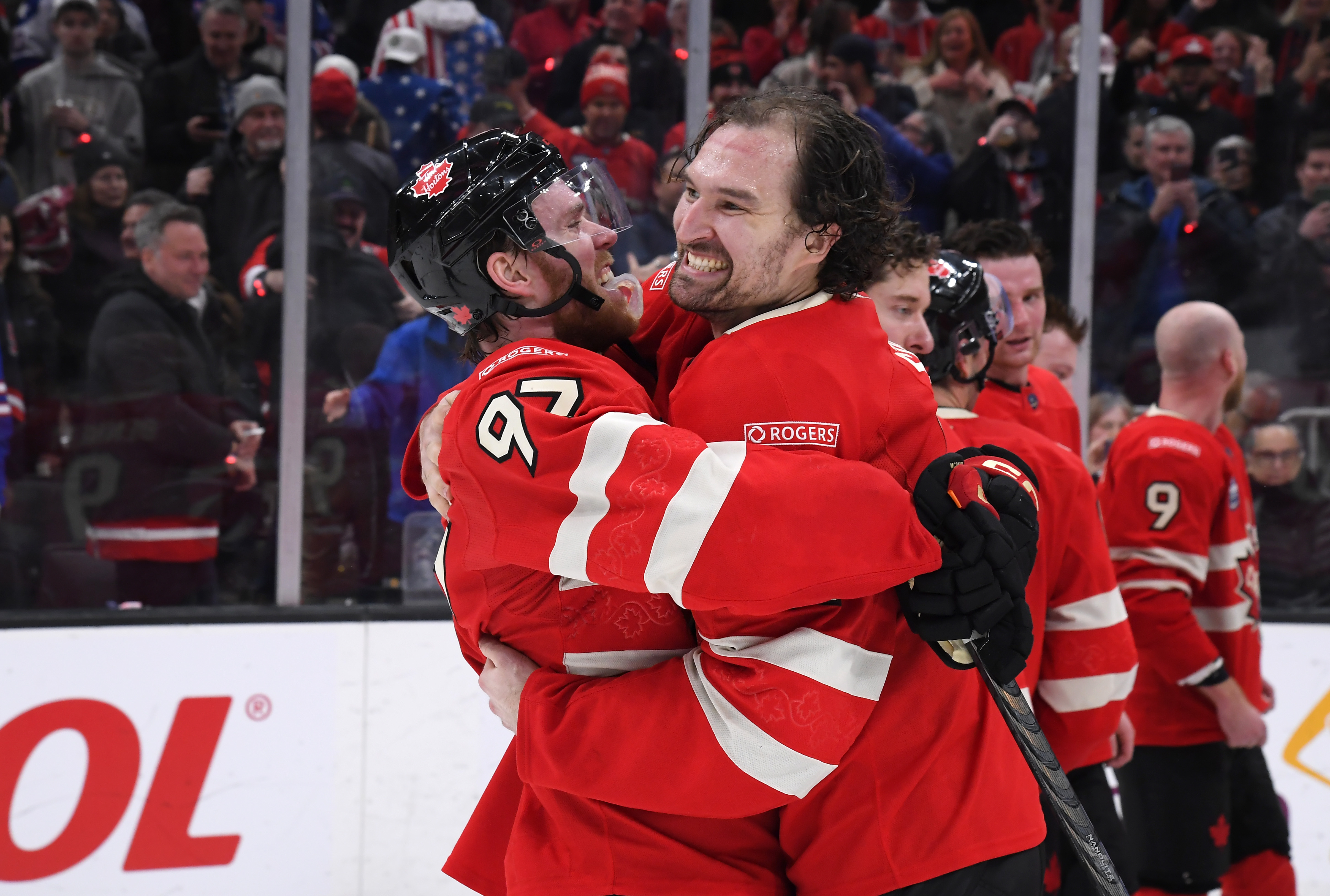 Connor McDavid #97 of Team Canada celebrates with Mark Stone #61 after scoring the game-winning goal on February 20, 2025 | Source: Getty Images