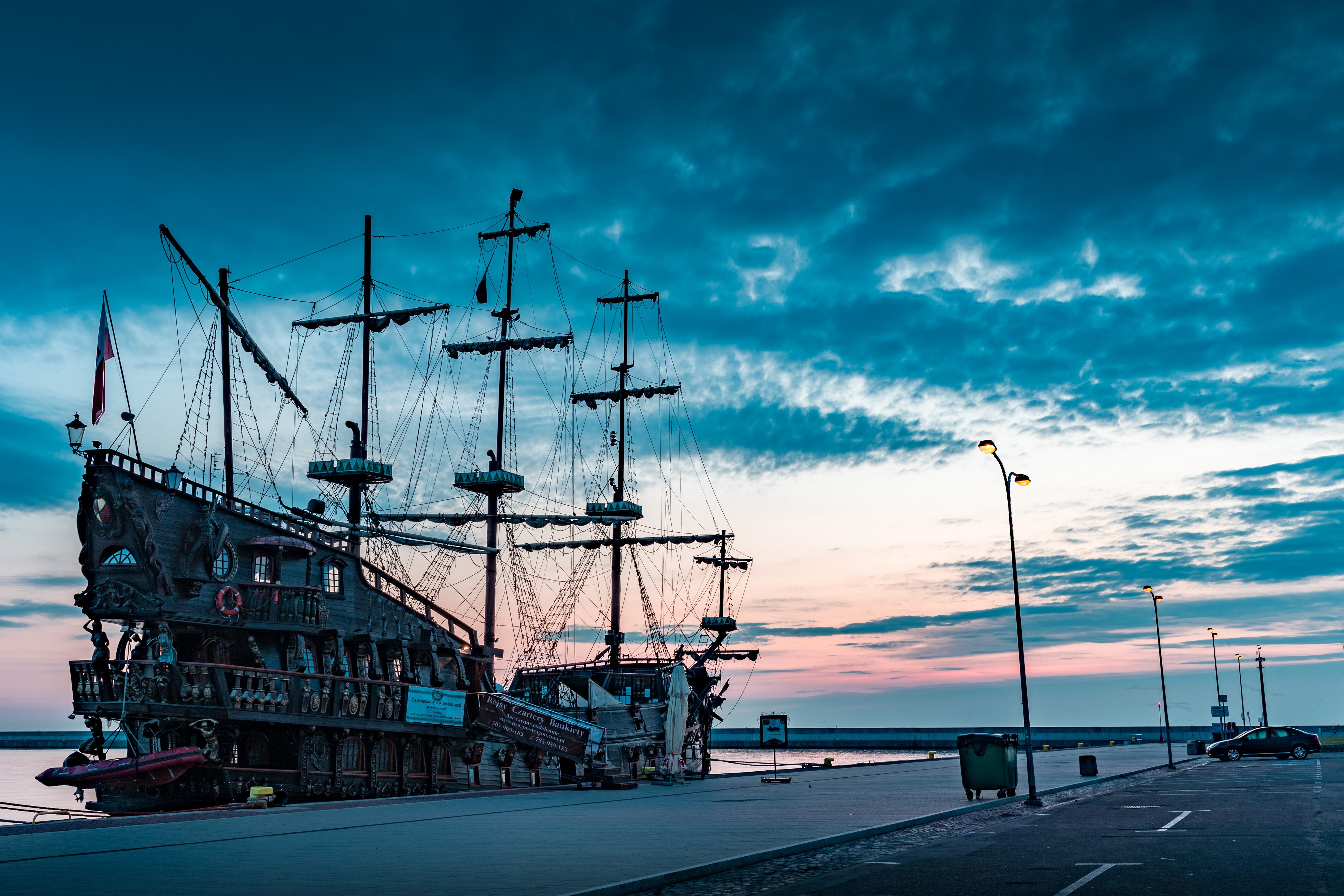 A galleon ship anchored at the dock | Source: Unsplash.com