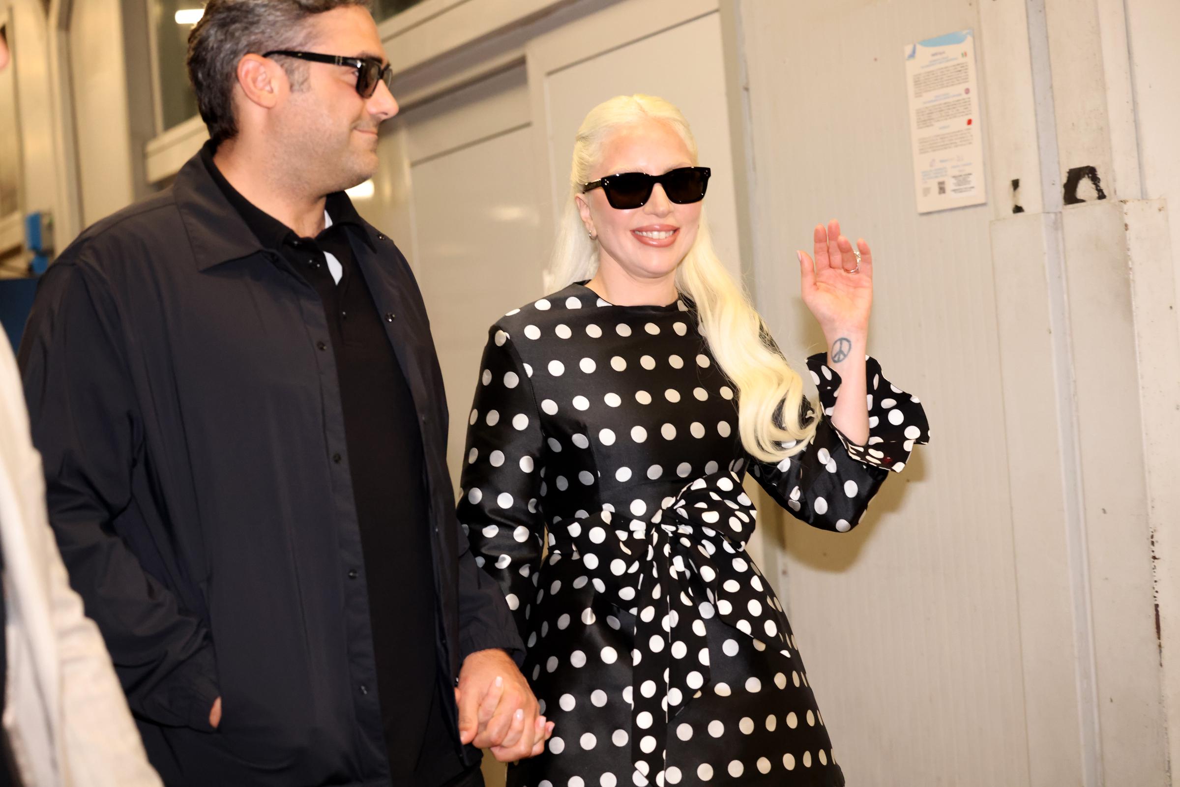 Michael Polansky and Lady Gaga arrive at Venice's airport during the 81st Venice International Film Festival on September 2, 2024, in Italy | Source: Getty Images