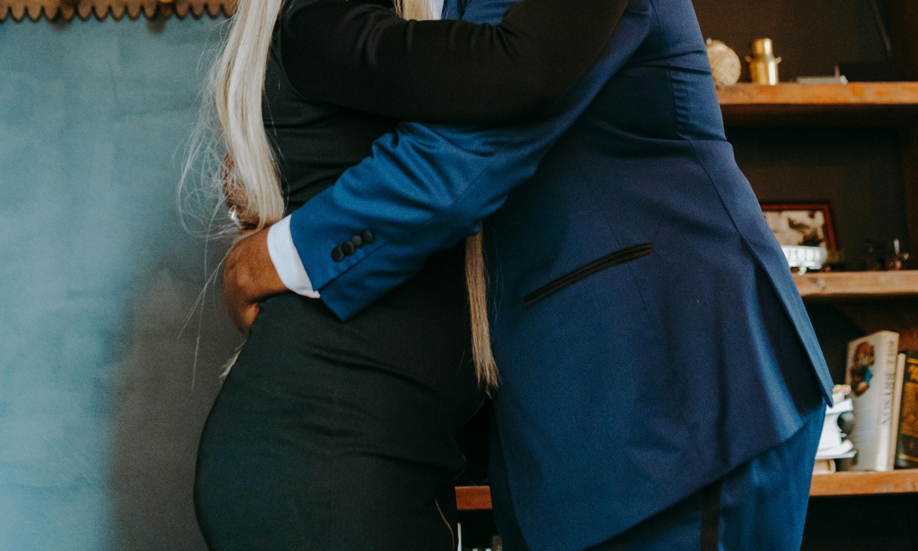 A man hugging a woman | Source: Pexels