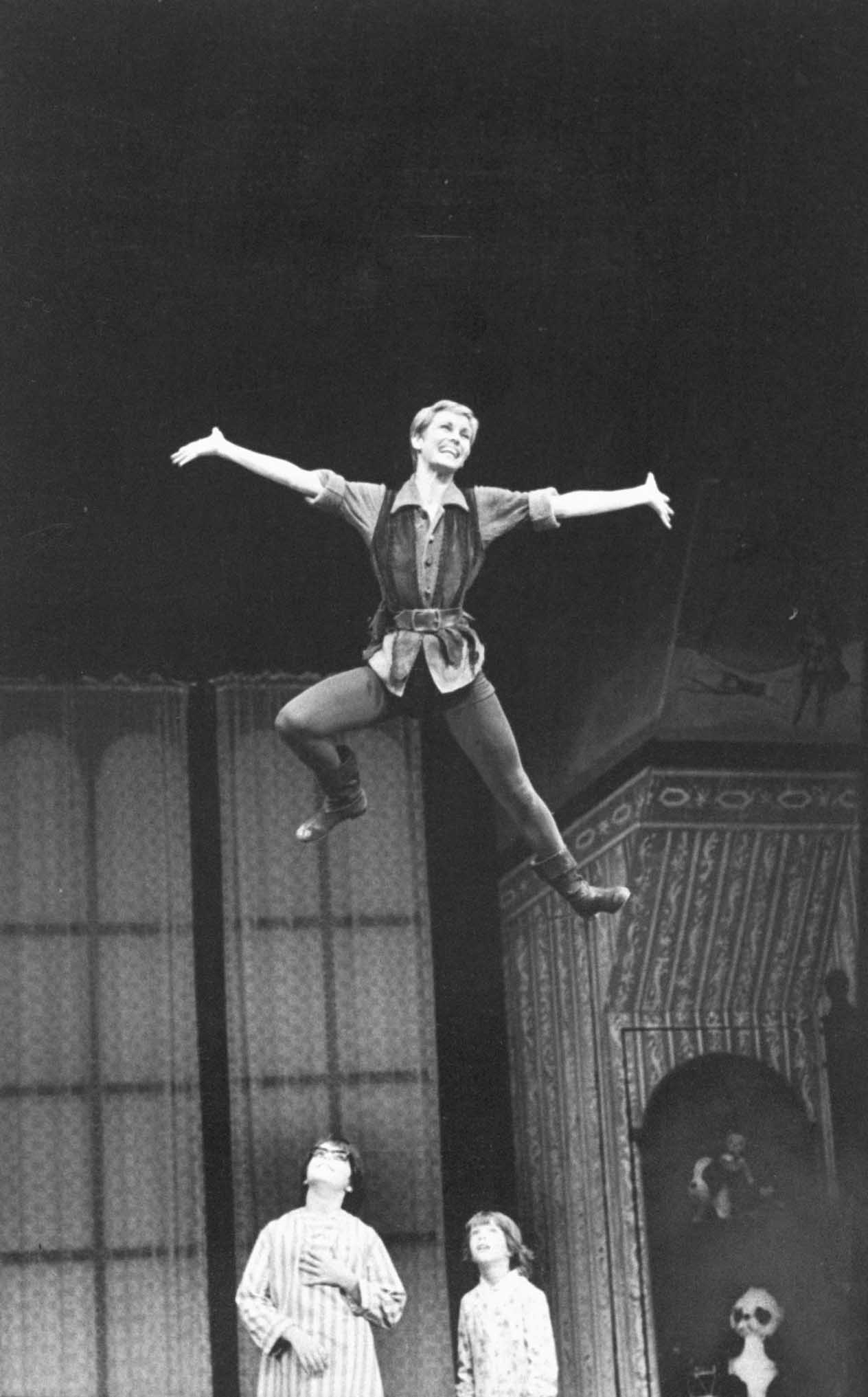 Sandy Duncan flying across stage, with Alex Winter and Jonathan Ward watching, during a performance of "Peter Pan" on Broadway in 1979 | Source: Getty Images