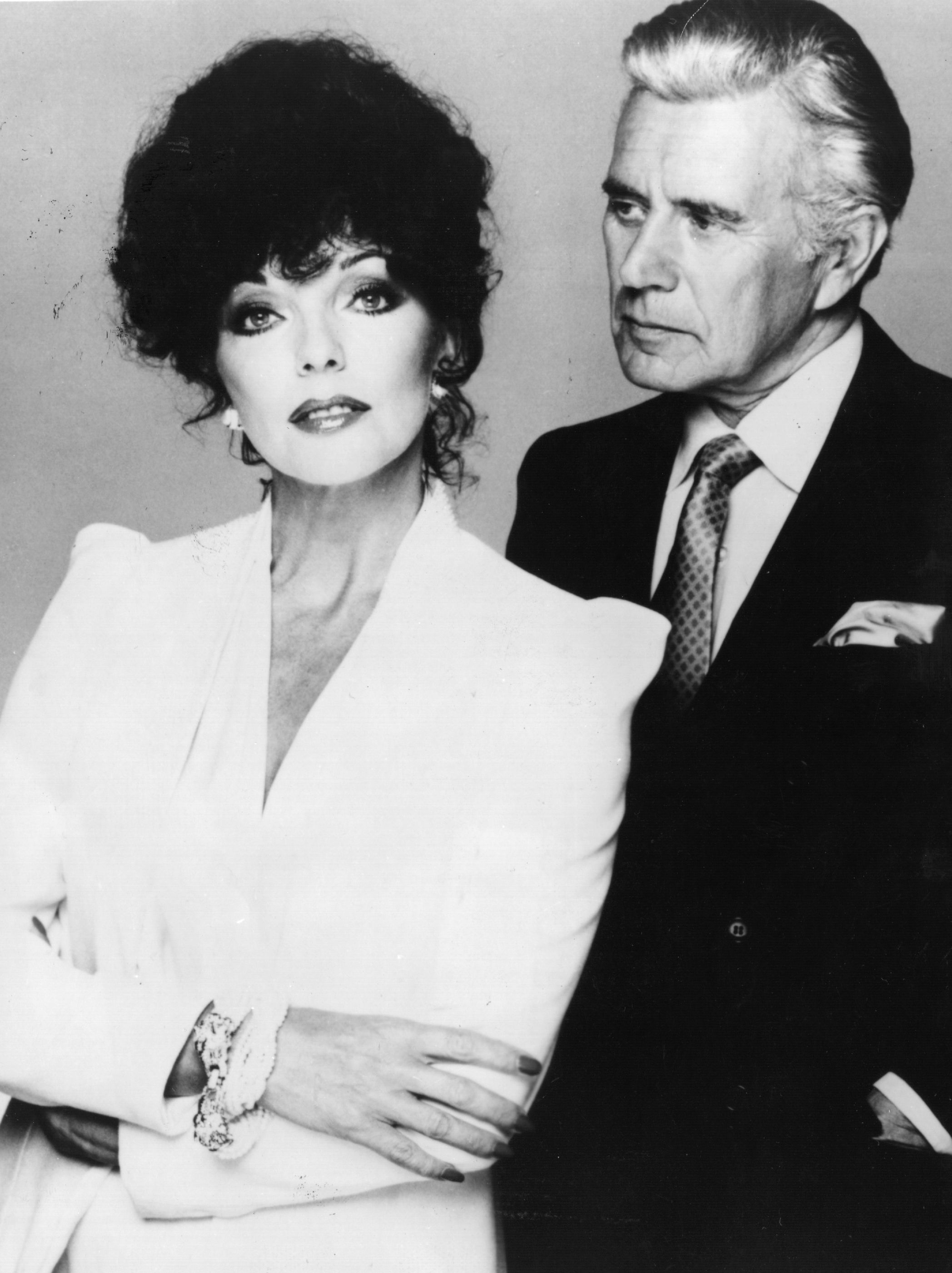 British actress Joan Collins and her 'Dynasty' TV series co-star John Forsythe | Photo: GettyImages