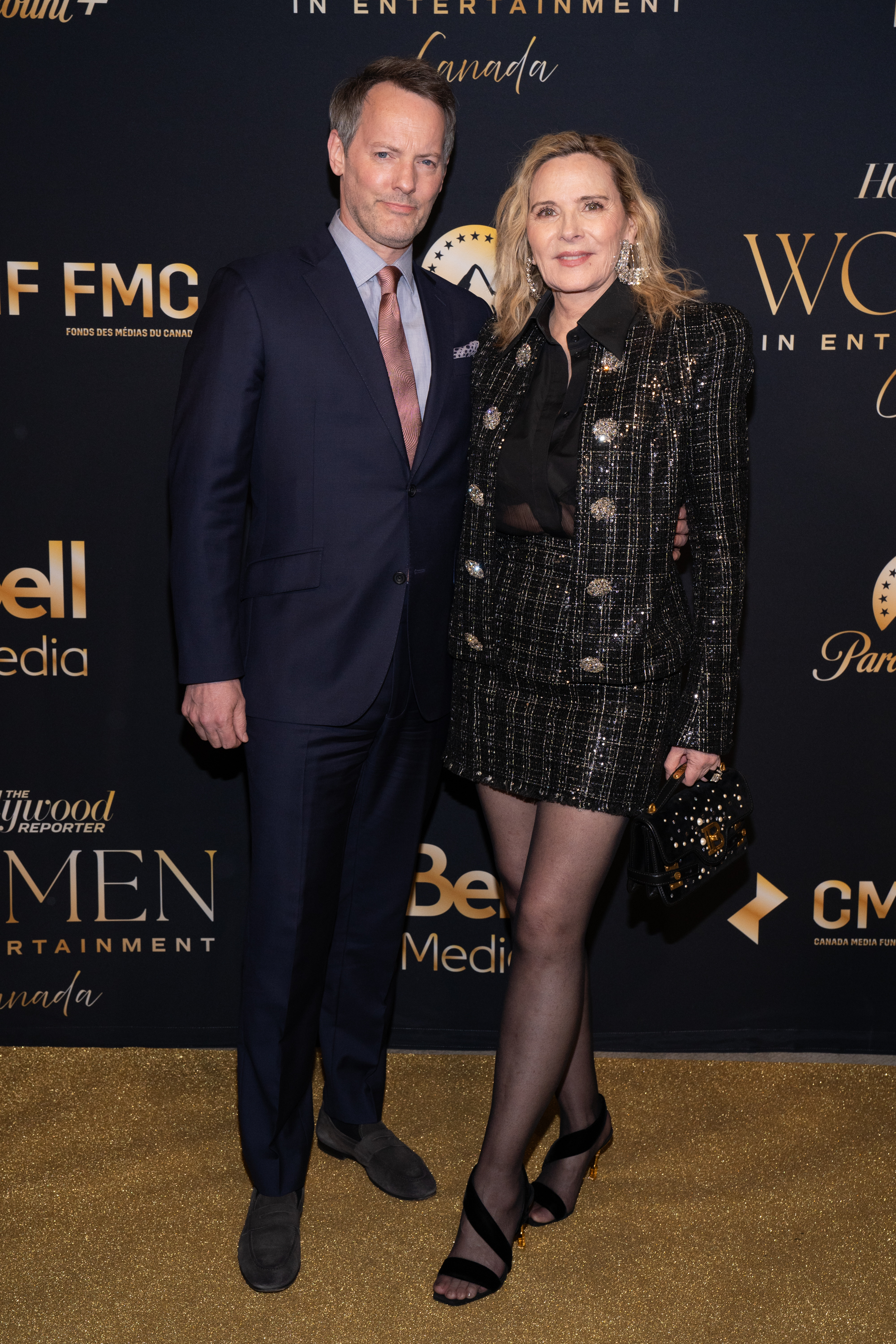 Russell Thomas and Kim Cattrall at The Hollywood Reporter's Women In Entertainment Canada Summit and Tribute Awards in Toronto, Ontario on May 30, 2024 | Source: Getty Images