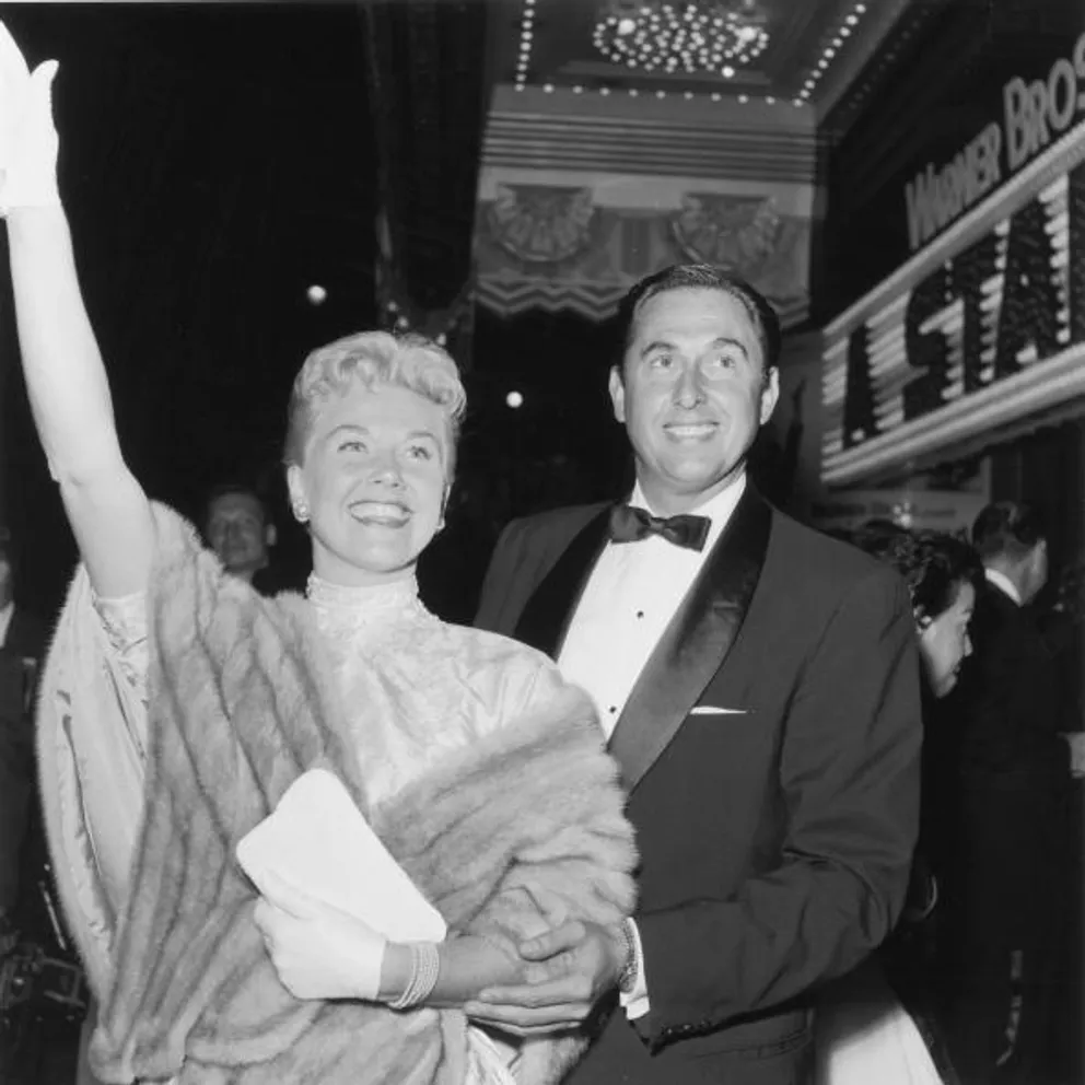 Doris Day and Marty Melcher, at the premiere of director George Cukor's film, "A Star is Born," Hollywood, California in 1954. | Photo: Getty Images