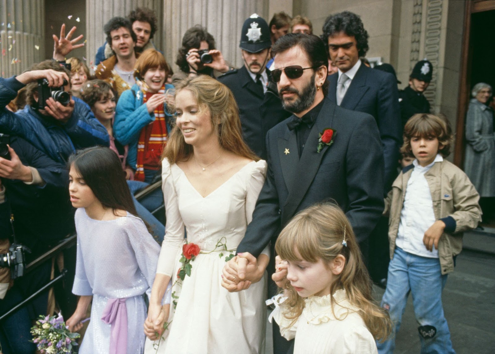 Barbara Bach and Ringo Starr on their wedding day at Old Marylebone Town Hall with their daughters Francesca Gregorini and Lee Starkey on April 26, 1981. | Source: Getty Images