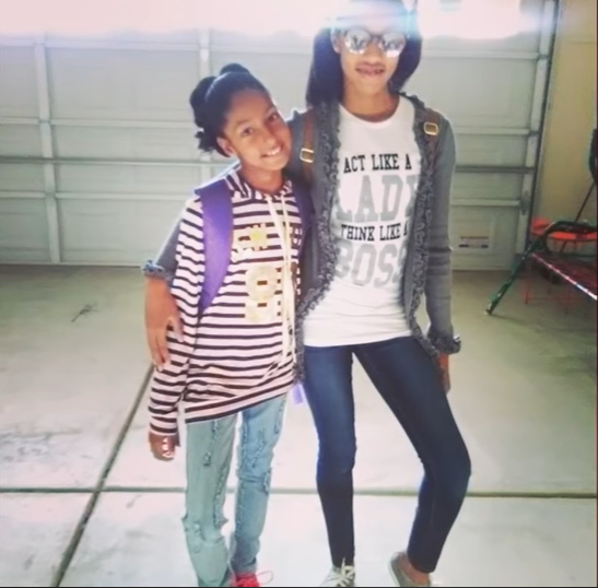 Photo of LaTonya Young and her daughter from a video dated September 6, 2021 | Source: YouTube/MrMcCruddenMichael
