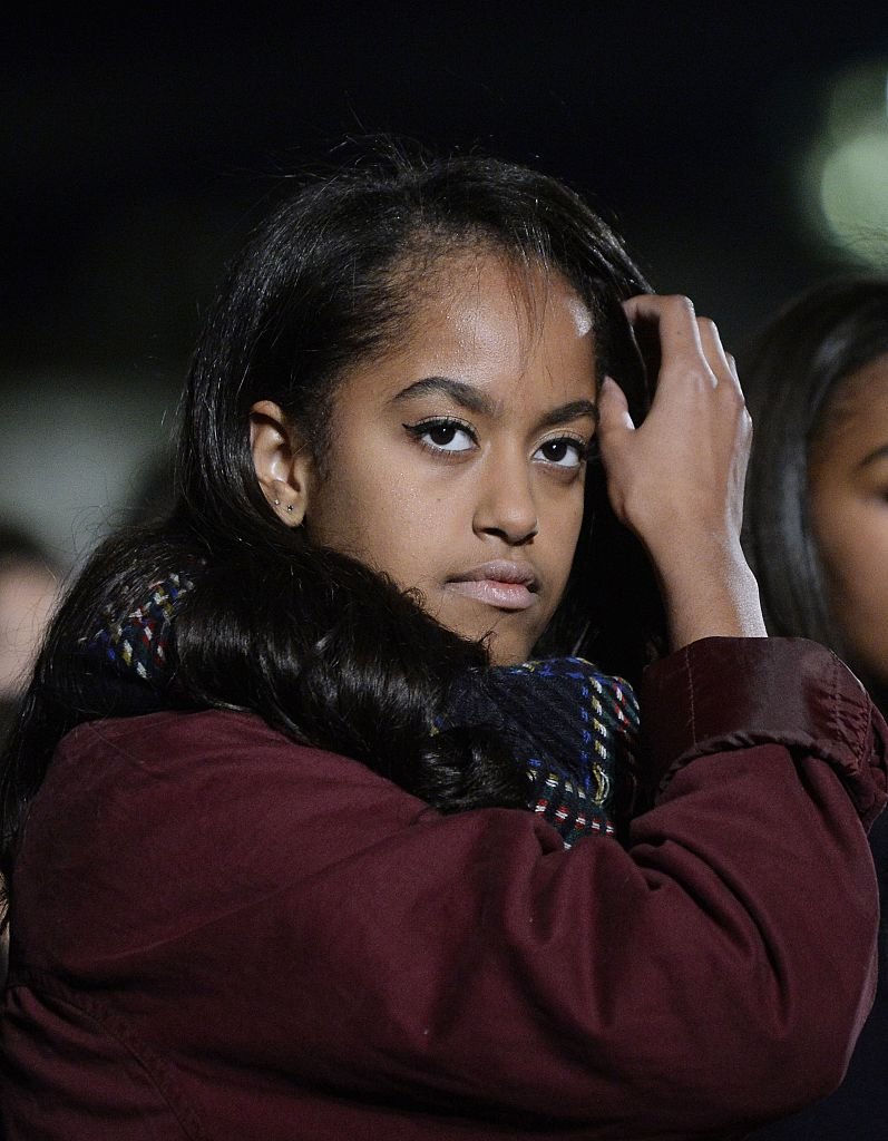 Malia Obama attends the national Christmas tree lighting ceremony on the Ellipse south of the White House | Photo: Getty Images