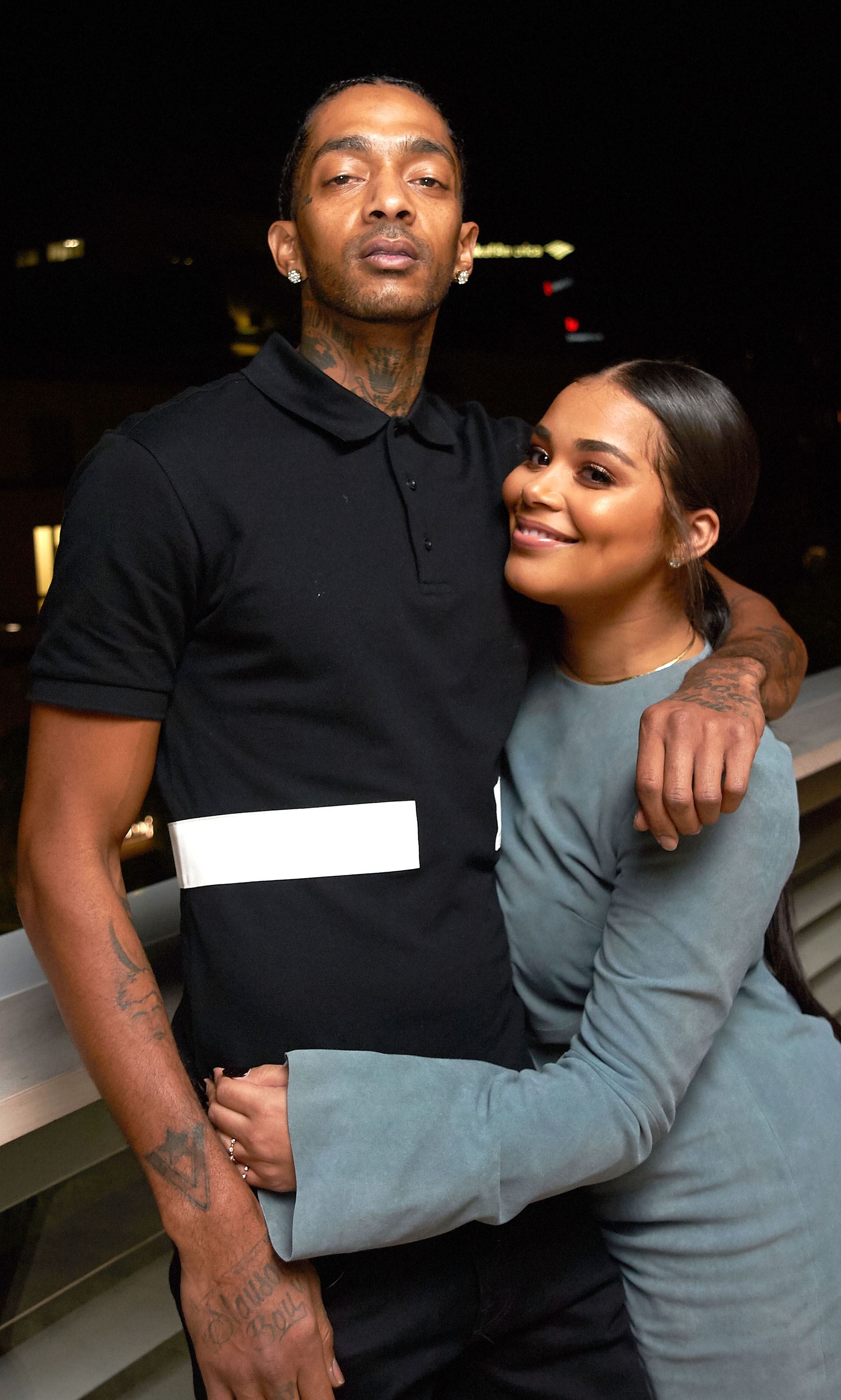 Nipsey Hussle and Lauren London at a private birthday dinner for author Karen Civil in November 2016. | Photo: Getty Images