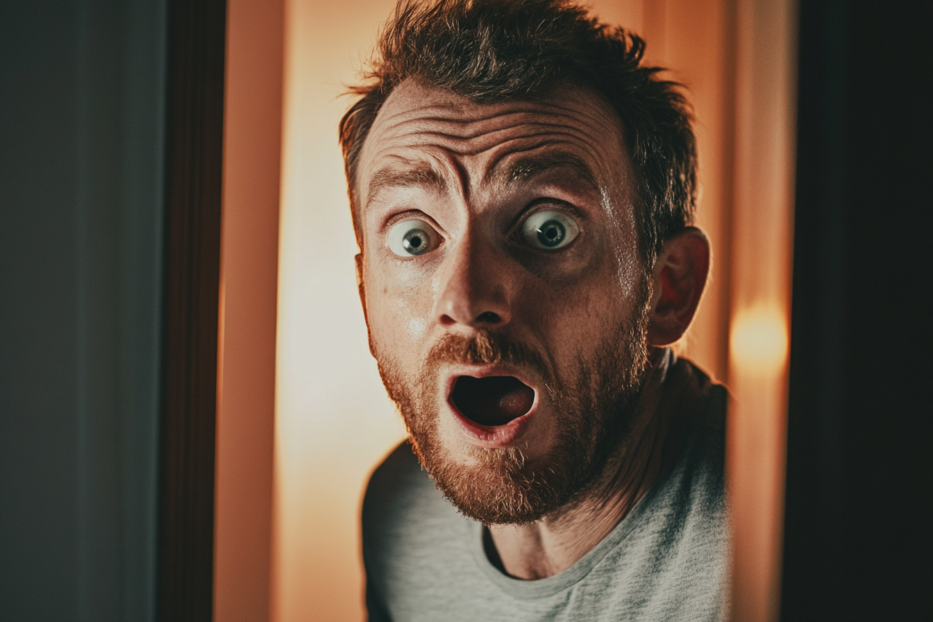 A shocked man at the doorway | Source: Midjourney