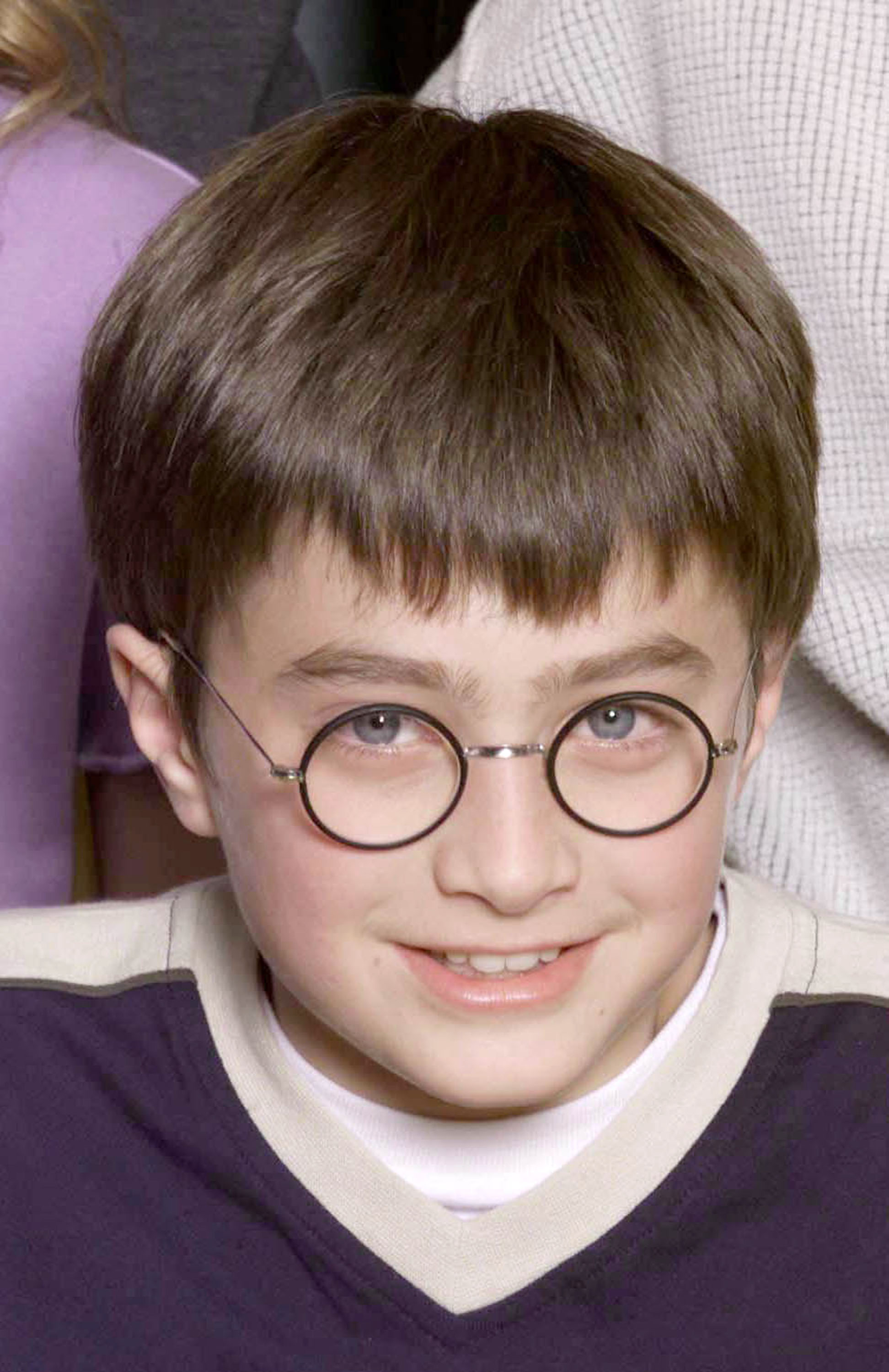 The boy at a press conference for the movie "Harry Potter and The Philosopher's Stone" in London on August 23, 2000 | Source: Getty Images