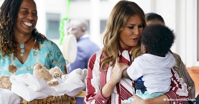 First lady Melania Trump visits a baby clinic after receiving a warm welcome in Ghana