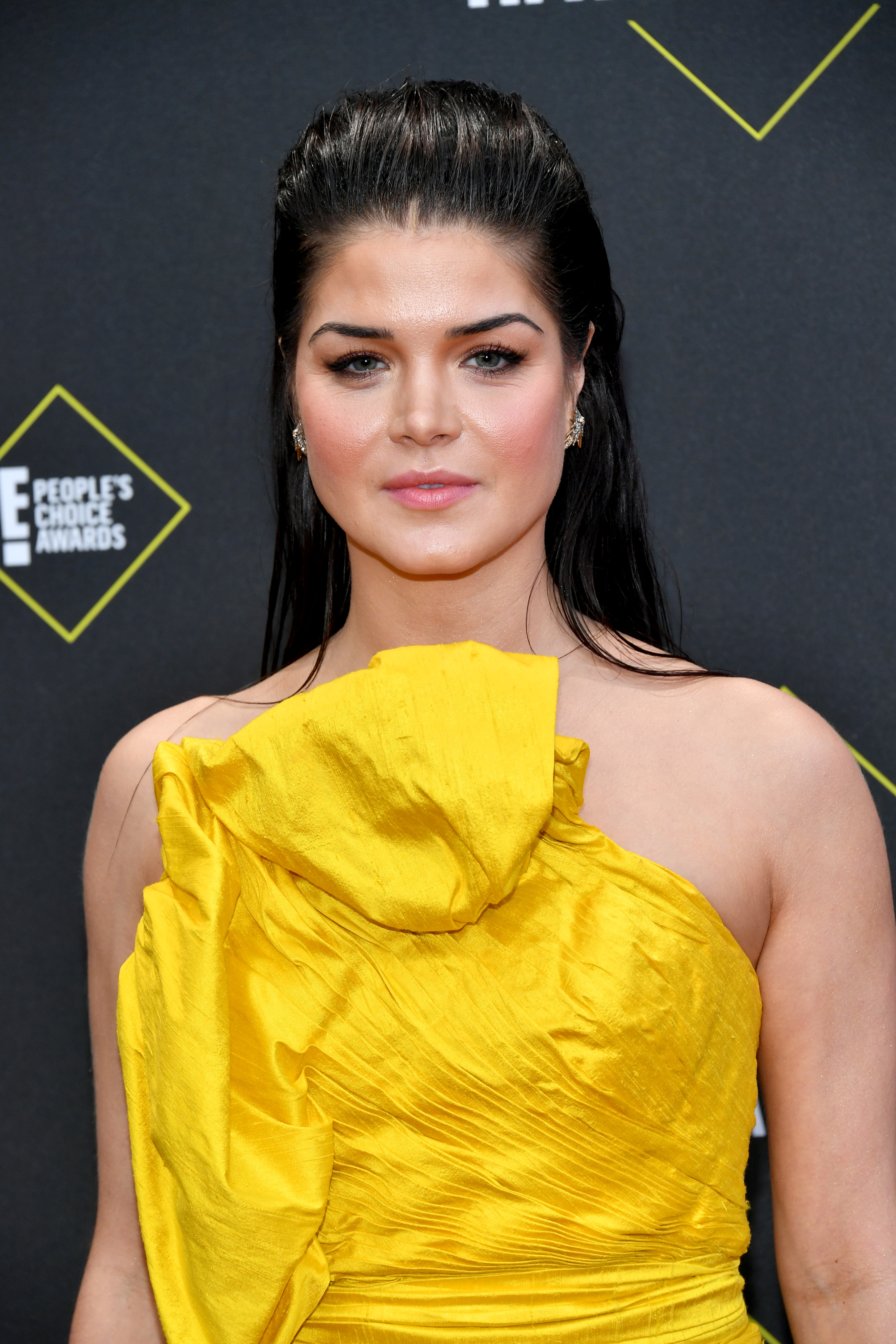 Marie Avgeropoulos arrives to the 2019 E! People's Choice Awards at the Barker Hangar on November 10, 2019, in Santa Monica, California.
