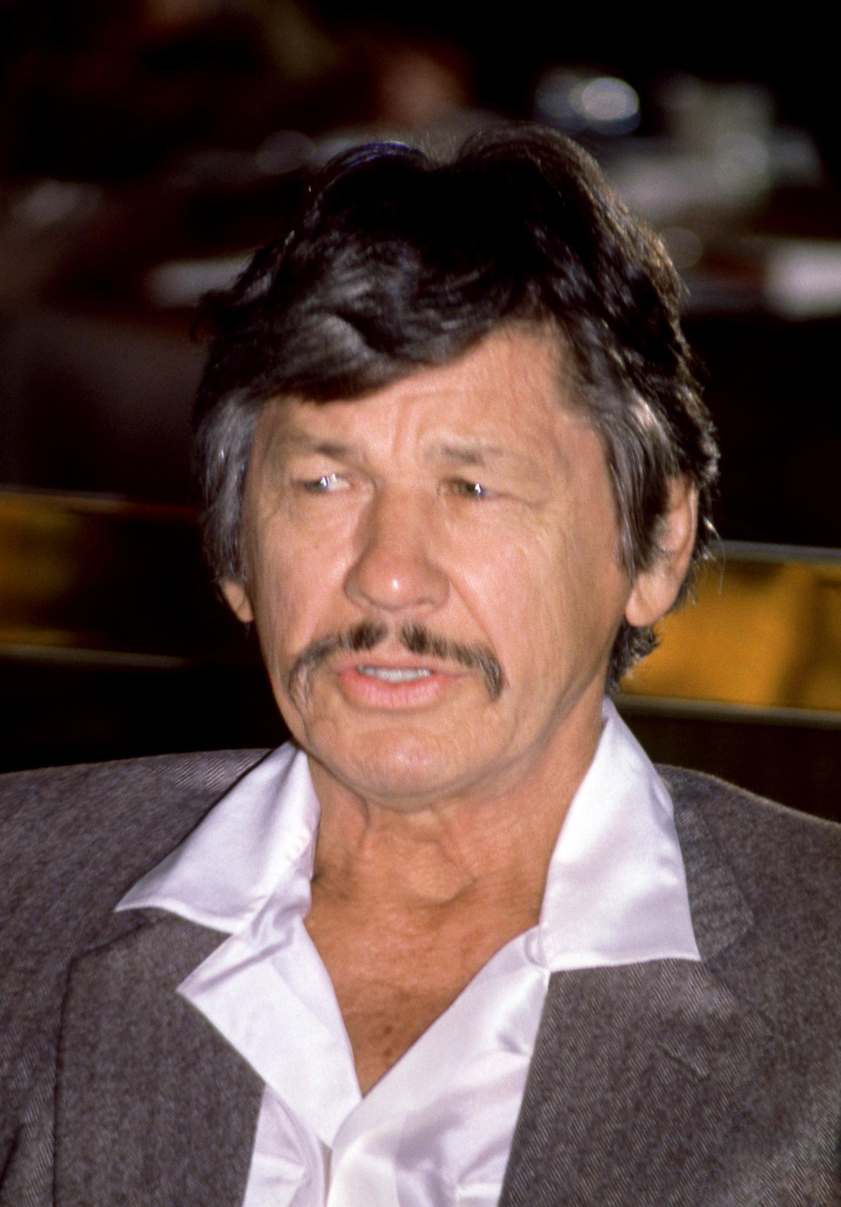 Charles Bronson's intimidating screen image was shaped by a childhood marked by poverty, hard labor, and years spent in the coal mines. Even after becoming a major Hollywood star, he spoke candidly about the insecurity and inferiority complex those early experiences left behind. | Source: Getty Images