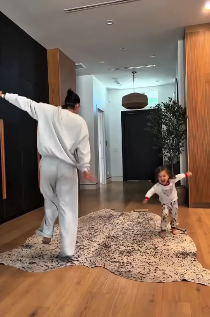 Shemar Moore's ex-girlfriend, Jesiree Dizon, and their daughter, Frankie Moore, dancing at home, from a video dated January 13, 2026 | Source: Instagram/shemarfmoore
