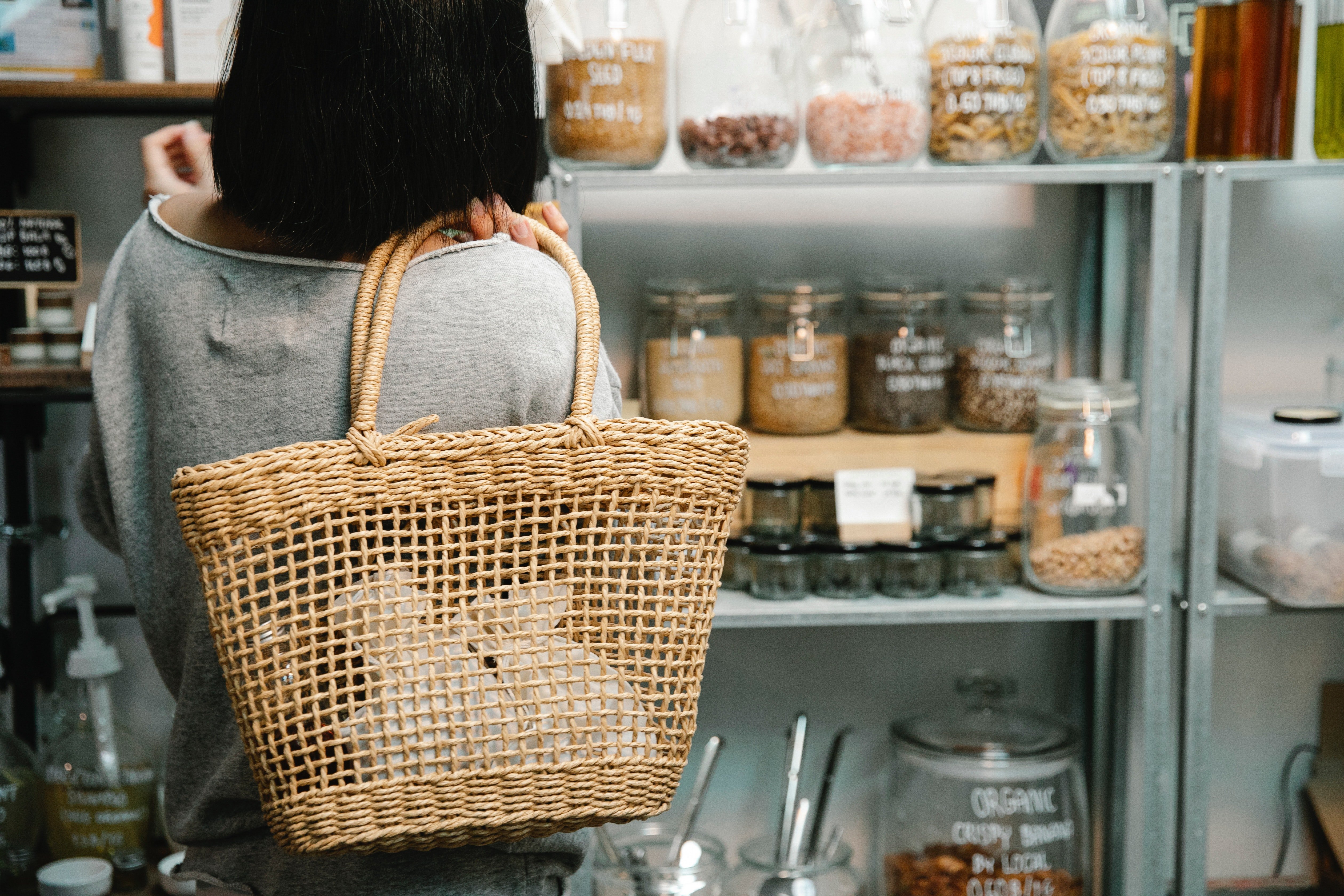 Teen wanders around the aisle in Walmart | Photo: Pexels