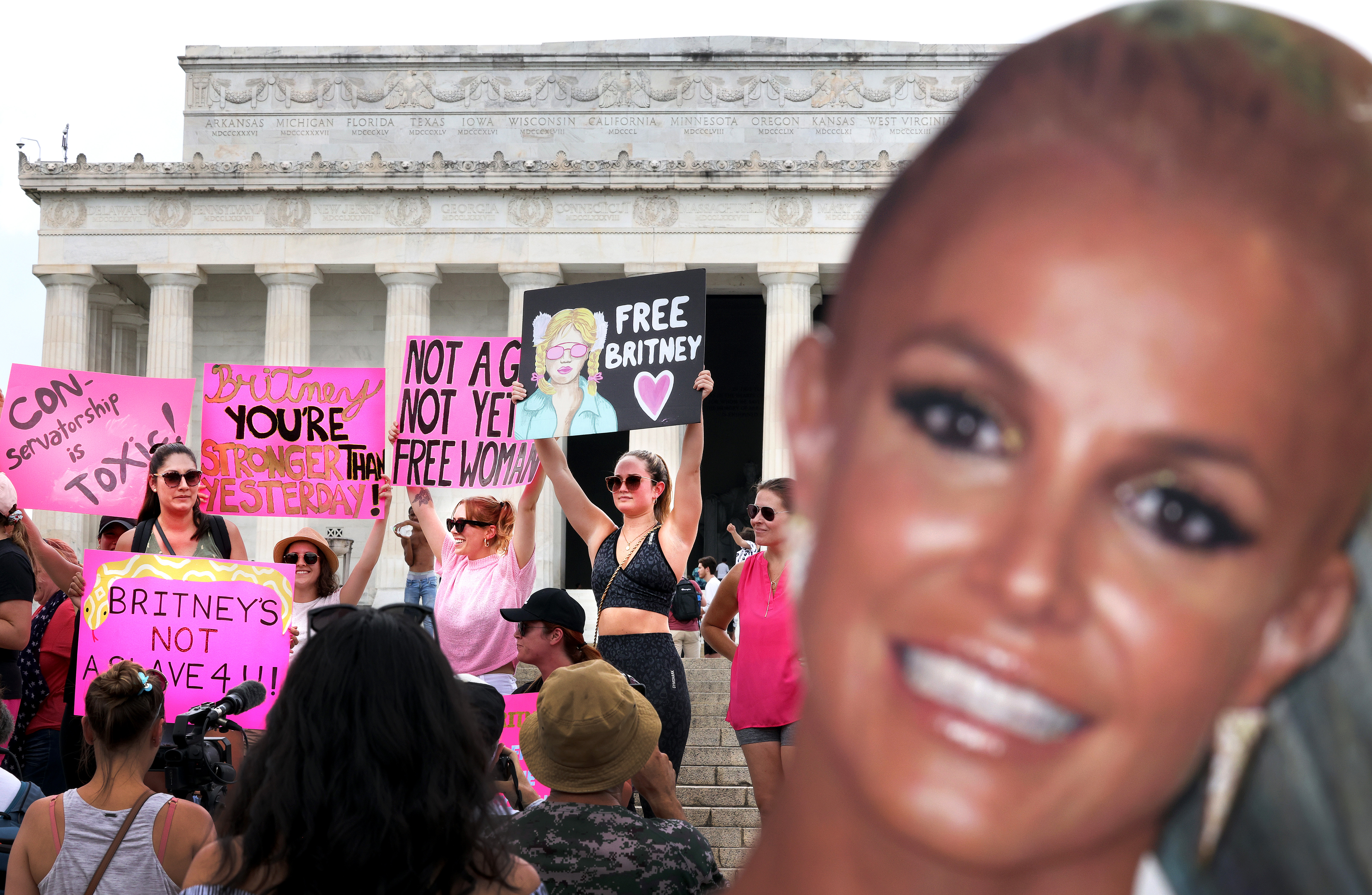 Supporters of pop star Britney Spears participate in a #FreeBritney rally in Washington, DC on July 14, 2021 | Source: Getty Images