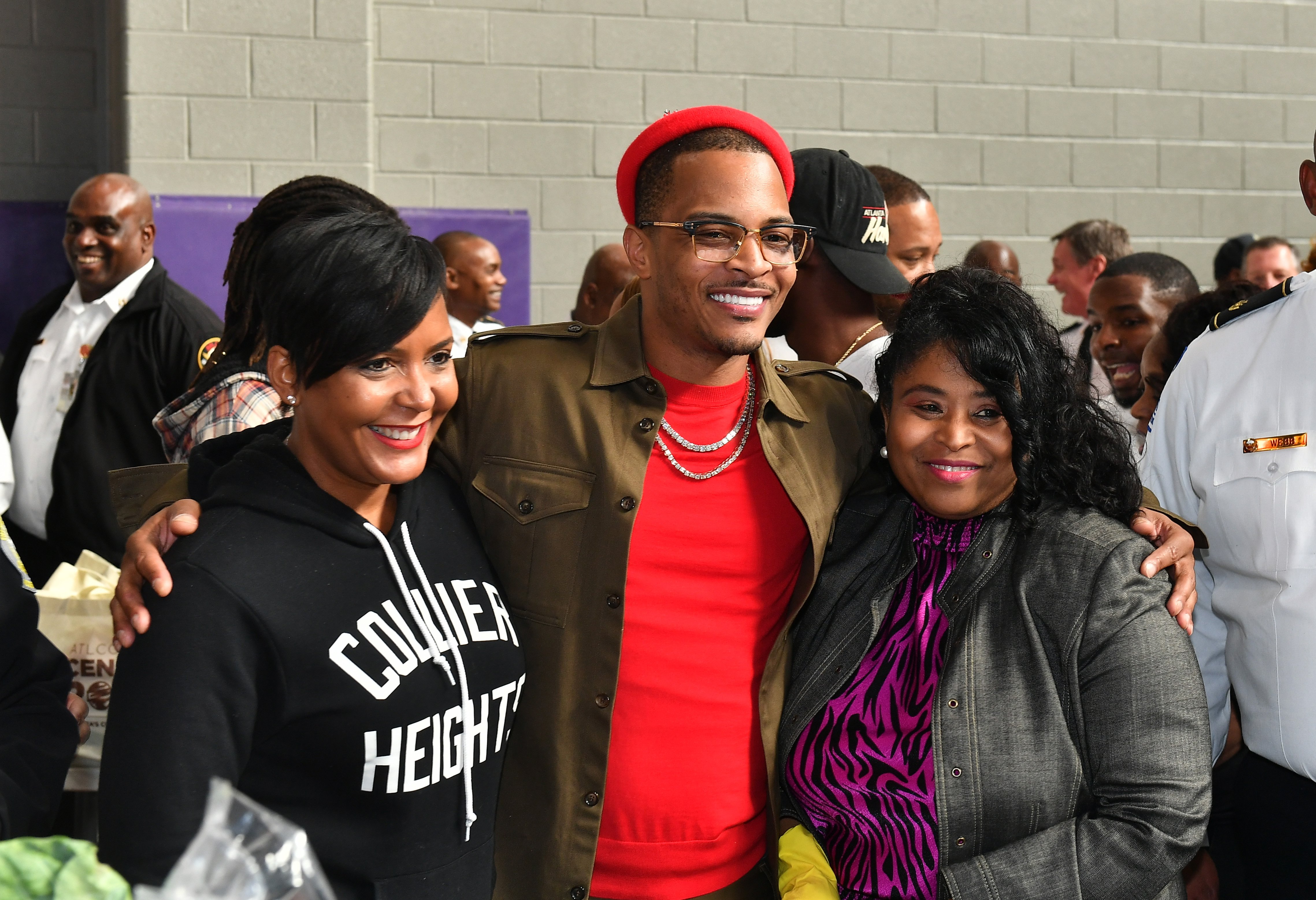 Keisha Lance Bottoms, T.I., and Andrea L. Boone attend T.I.'s 14th Annual Thanksgiving Turkey Giveaway on November 26, 2019 | Photo: GettyImages