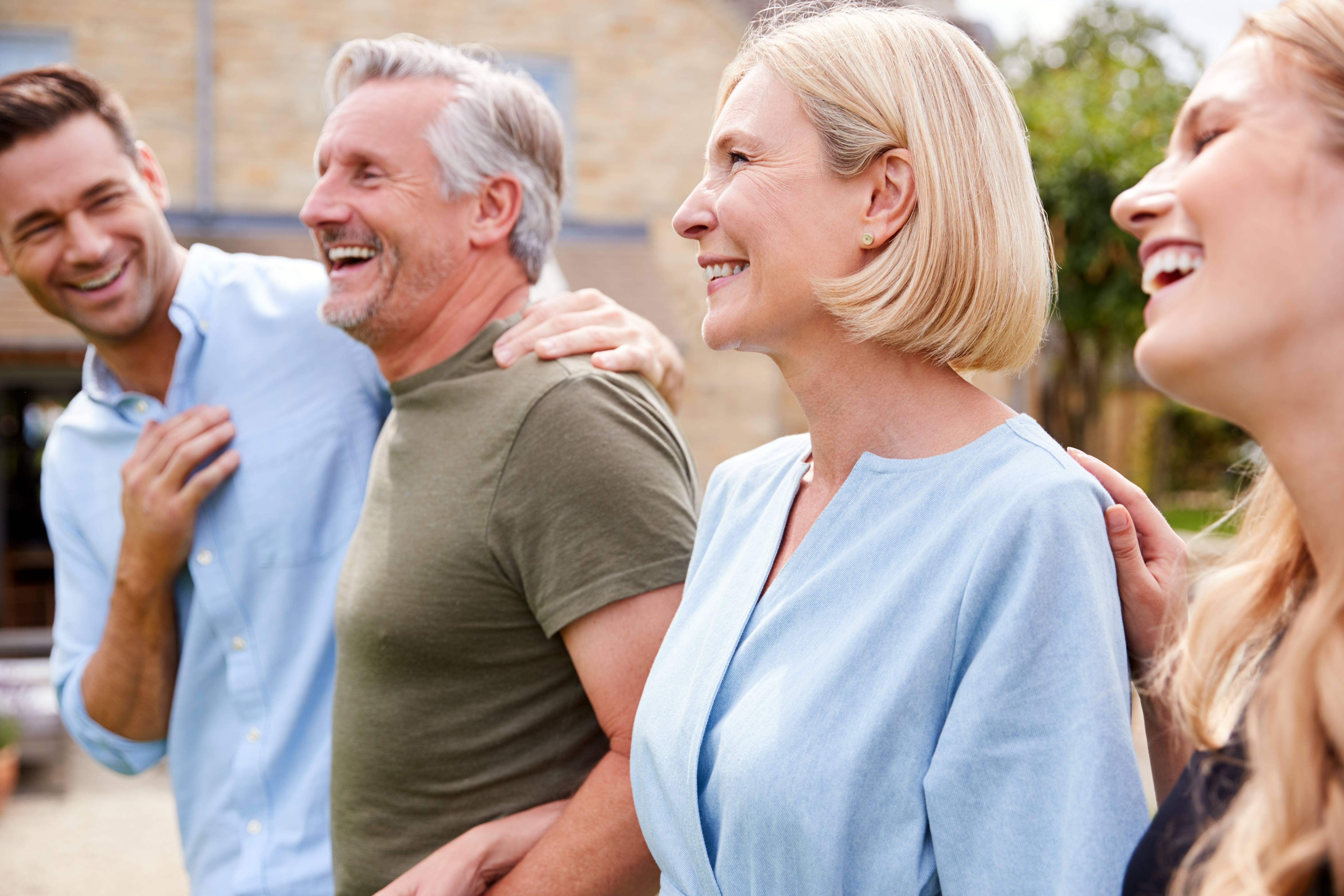 A happy family of four | Source: Shutterstock