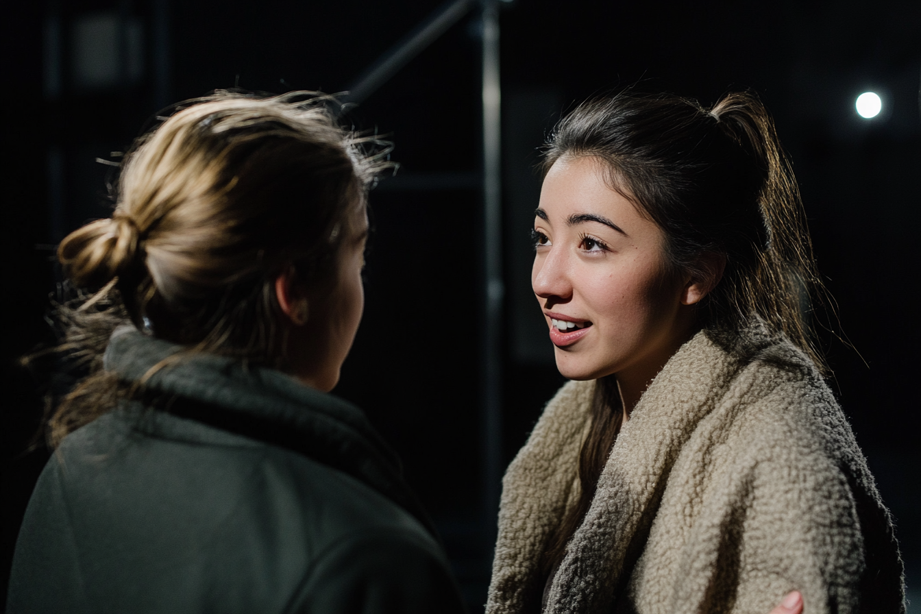 A woman talking to her friend | Source: Midjourney