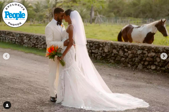 Etienne Maurice and Stephanie Wash sharing a tender moment on their wedding day, posted on July 13, 2024 | Source: Instagram/walkgoodetienne and wash news