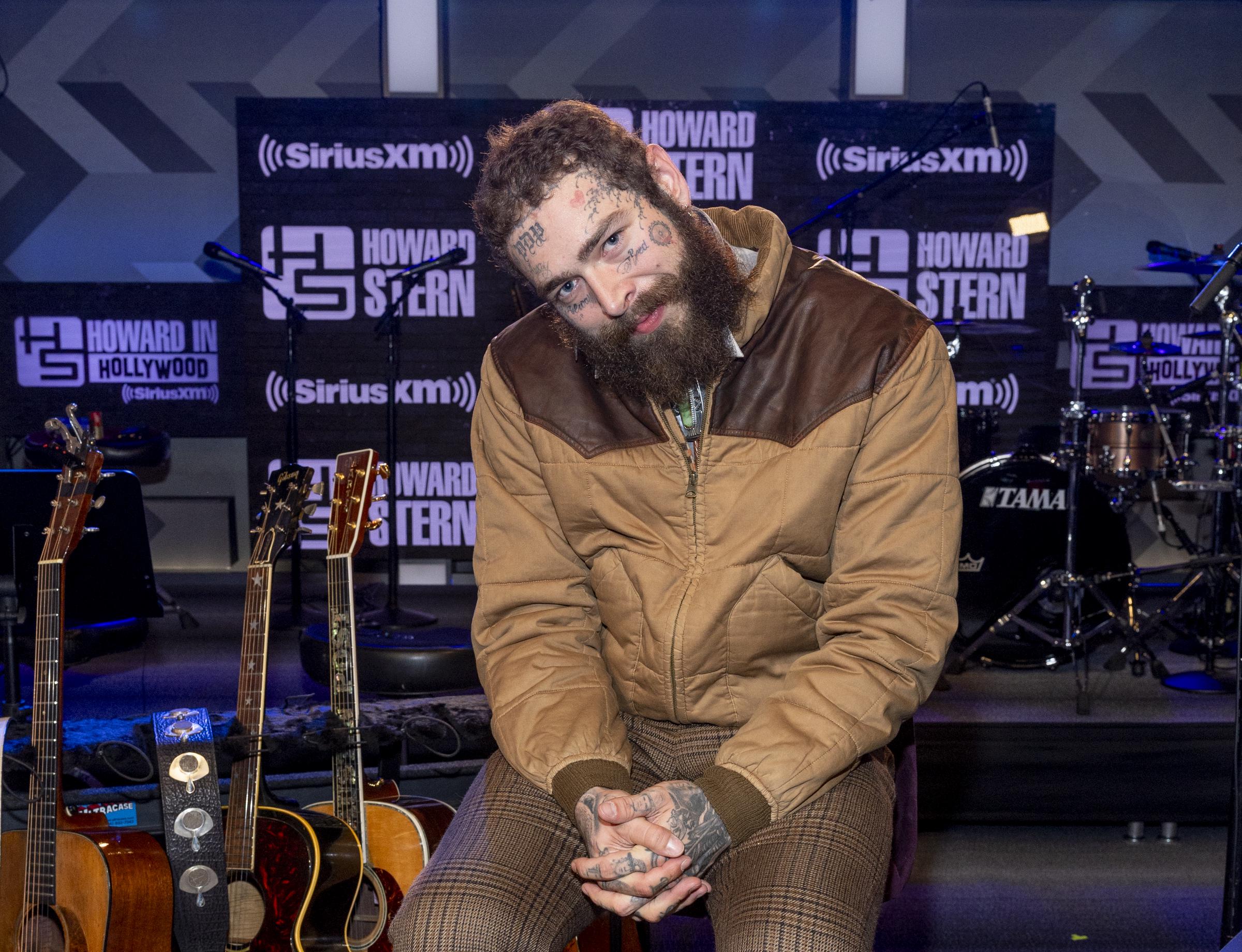 Post Malone visits SiriusXM's "The Howard Stern Show" in Los Angeles, California, on October 17, 2023 | Source: Getty Images