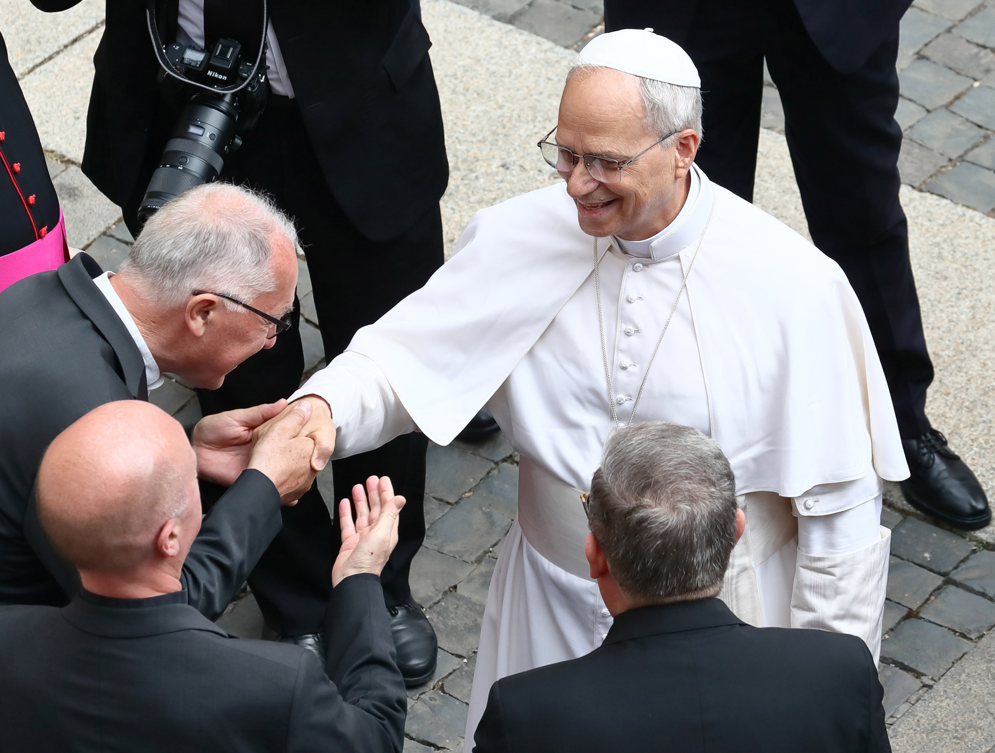 Pope Leo XIV greets at the end of the Angelus prayer on July 13, 2025, in Castel Gandolfo, Italy. | Source: Getty Images