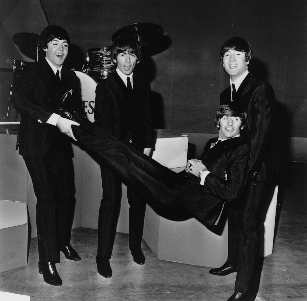 Ringo Starr being given the bumps by the other members of popular rock group The Beatles on his 24th birthday. | Getty Images / Global Images Ukraine Ringo Starr being given the bumps by the other members of popular rock group The Beatles on his 24th birthday. | Getty Images / Global Images Ukraine