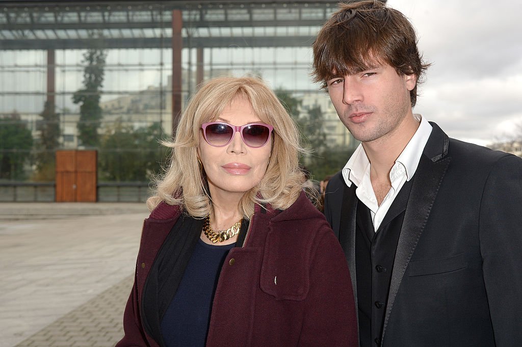 Amanda Lear et Anthony Hornez, à Paris le 16 janvier 2014. | Photo : Getty Images