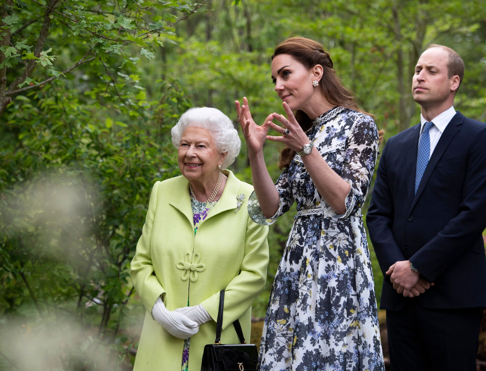 Queen Elizabeth II is shown around 'Back to Nature' by Prince William and Catherine, Duchess of Cambridge | Getty Images 