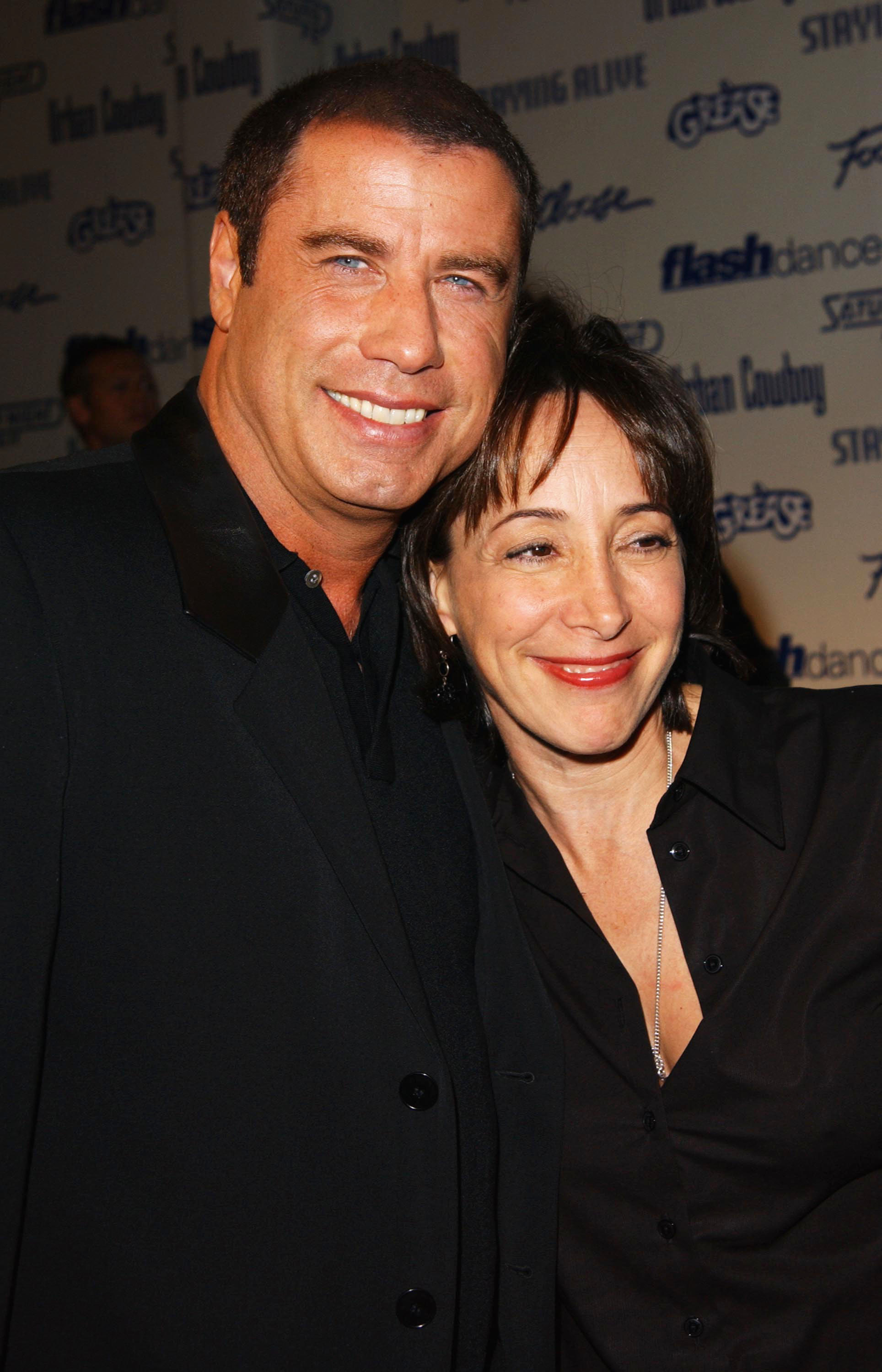 Actor John Travolta poses with the actress on September 22, 2002 | Source: Getty Images