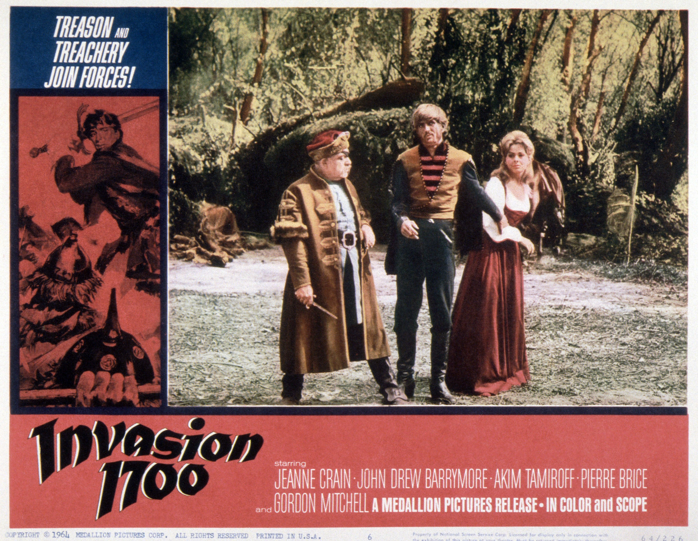 Akim Tamiroff, John Drew Barrymore, Jeanne Crain, on the 'Invasion 1700 poster in 1962. | Source: Getty Images