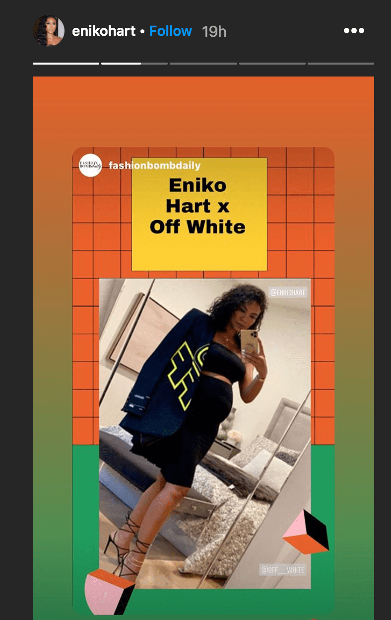 Eniko Hart takes a mirror selfie in a blazer by the label "Off White" | Source: Instagram.com/enikohart