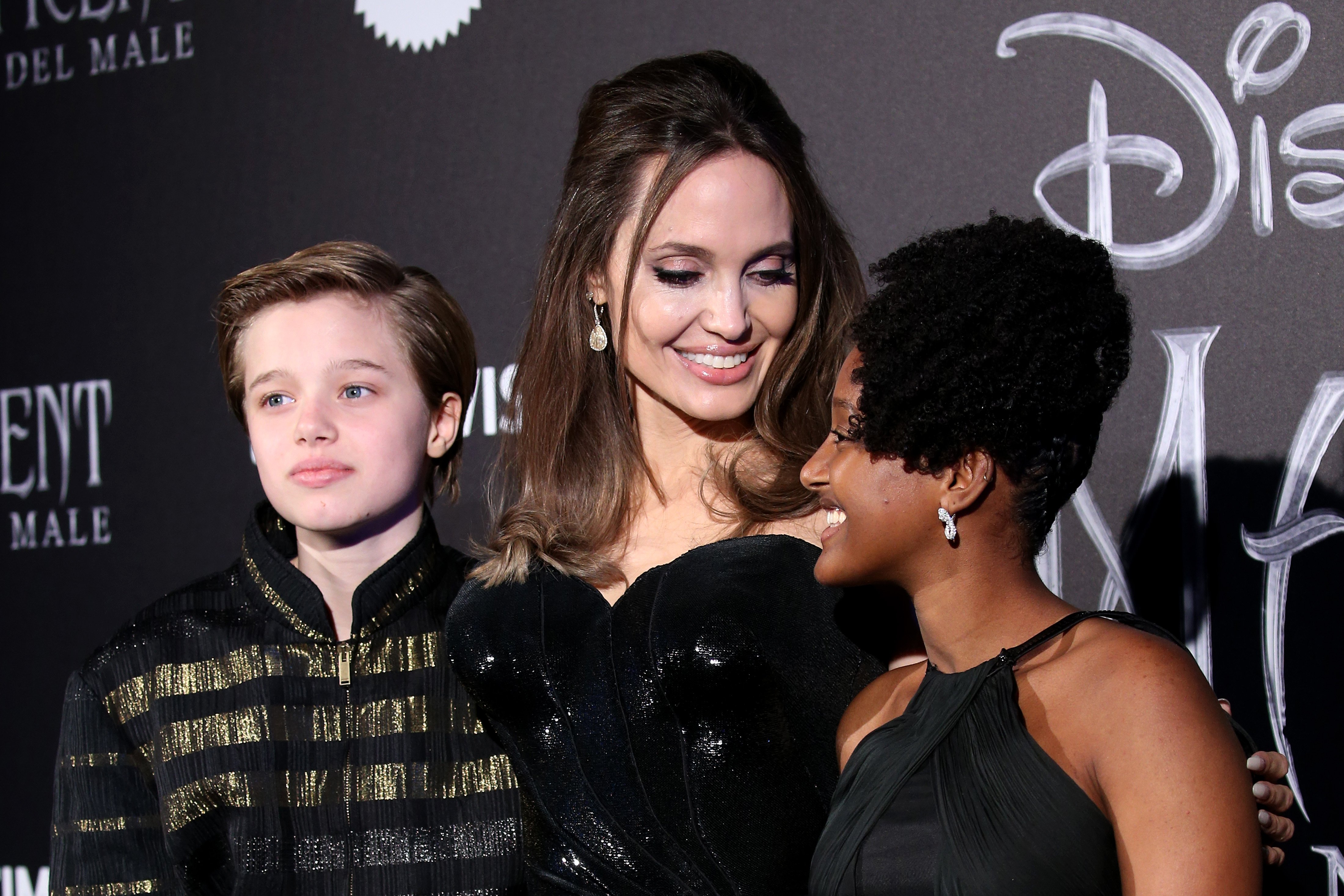 Shiloh Nouvel Jolie-Pitt, Angelina Jolie, and Zahara Marley Jolie-Pitt at\\u00a0the European premiere of\\u00a0"Maleficent – Mistress of Evil"\\u00a0on October 7, 2019, in Rome, Italy | Source: Getty Images