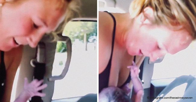 Woman gives birth in moving car while husband films and children watch in shock