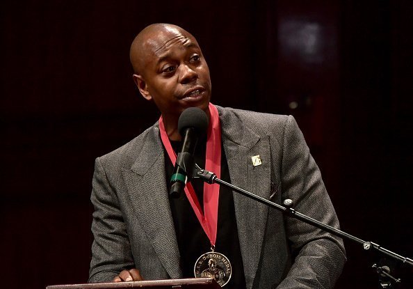 Dave Chappelle on stage at the W.E.B. Du Bois Medal Award Ceremony at Harvard University on October 11, 2018. | Source: Getty Images